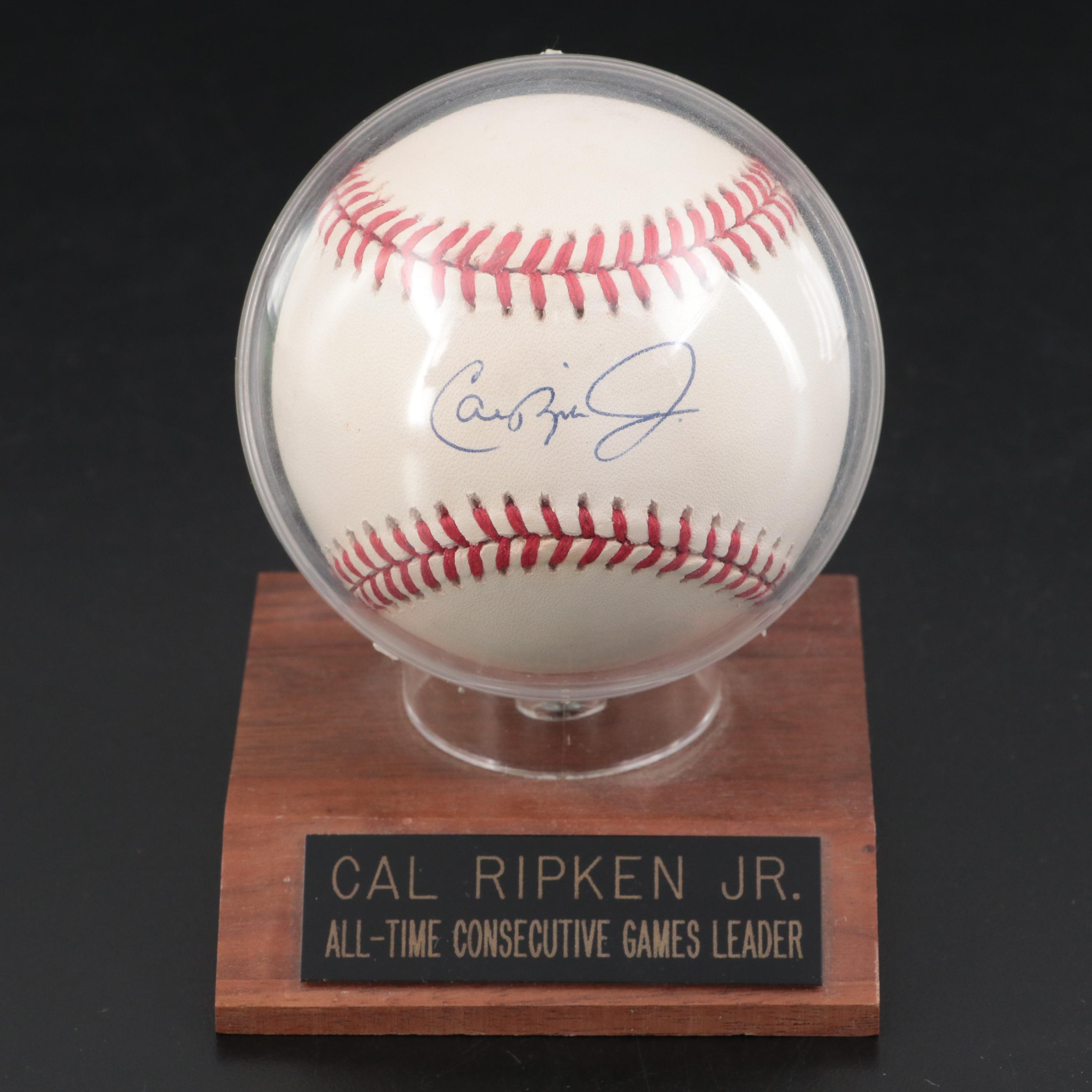 Ripken Jr. Signed Rawlings Baseball on "All-Time Consecutive Games Leader" Stand