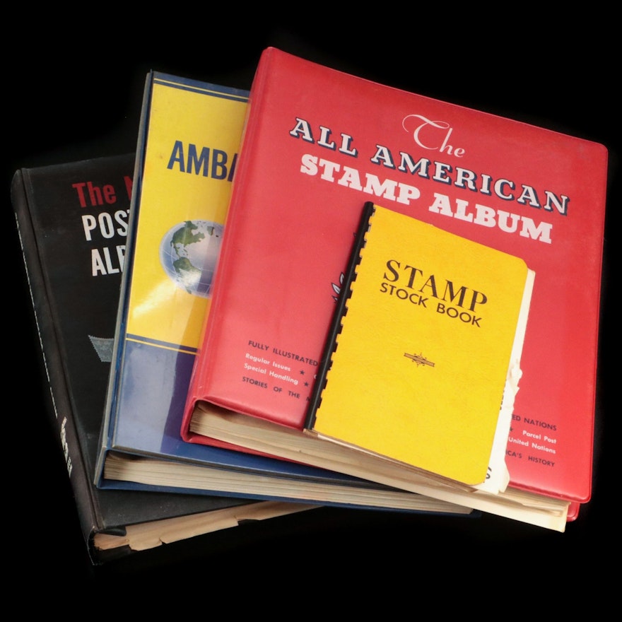 Three Partially Filled Postage Stamp Collection Albums and a Stamp Stock Book