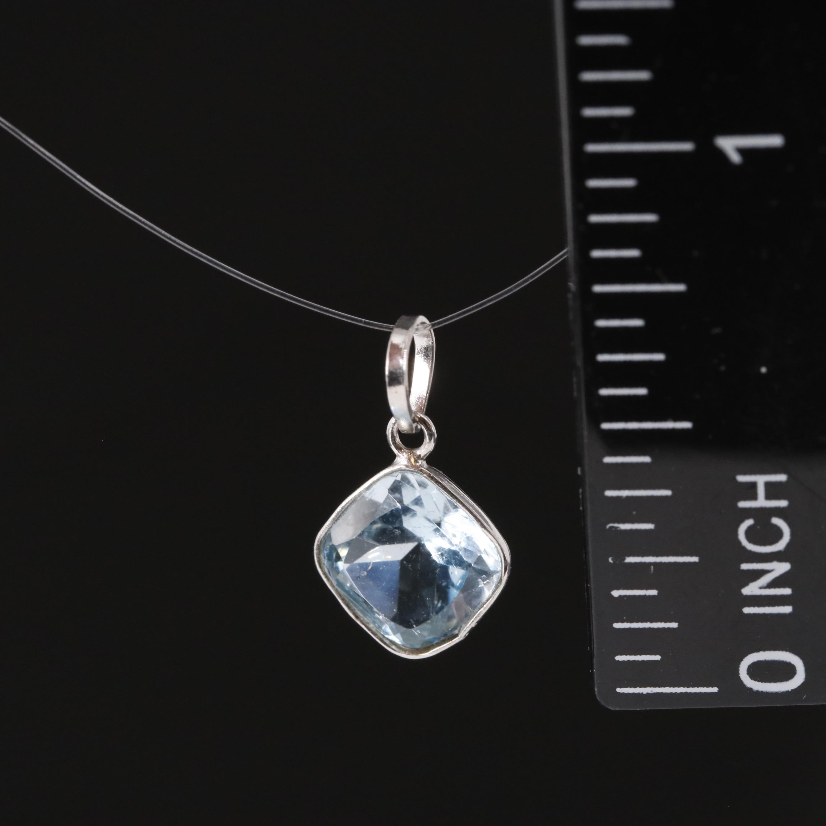 14K Blue Topaz Pendant