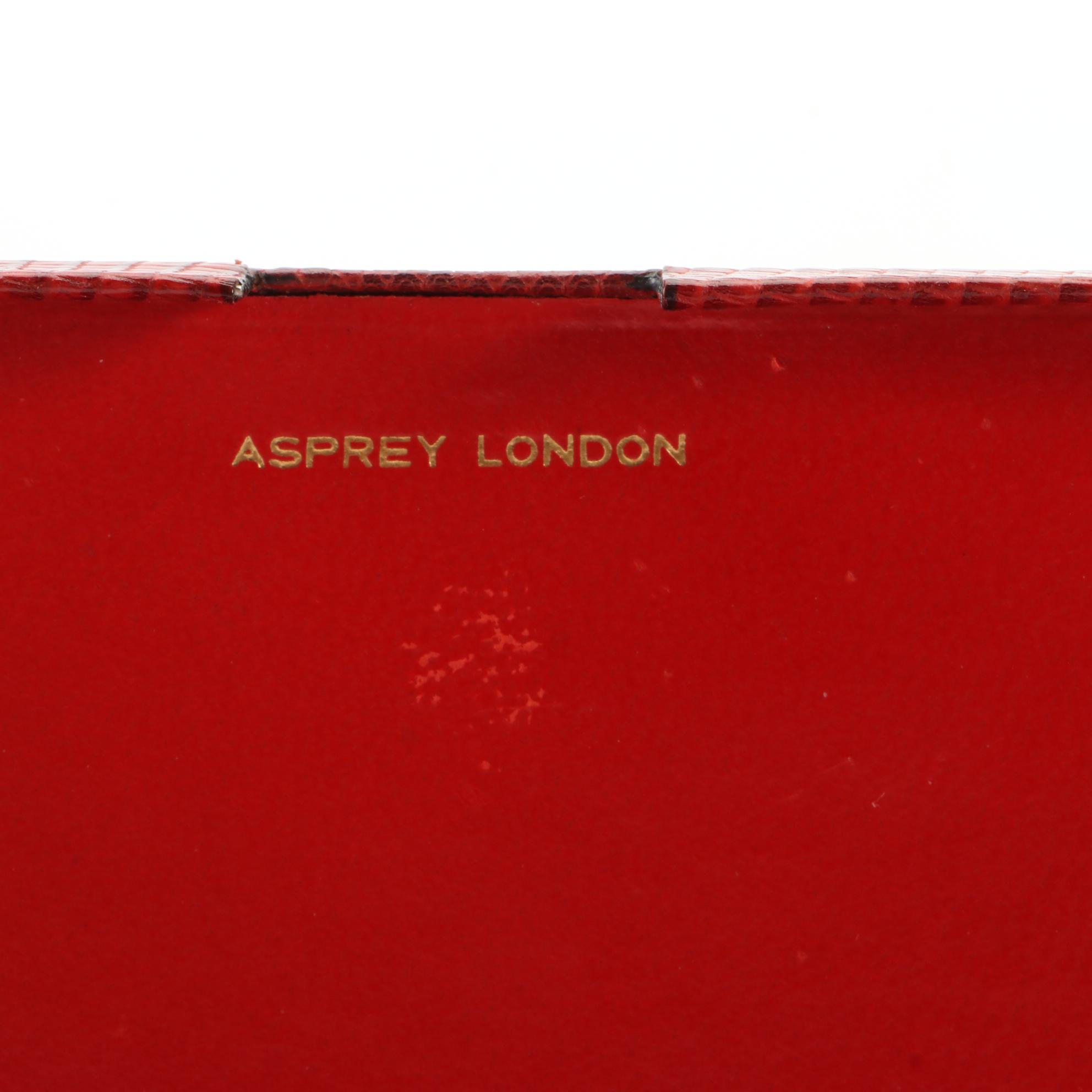 Dooney & Bourke Pouch in Alligator Skin and More