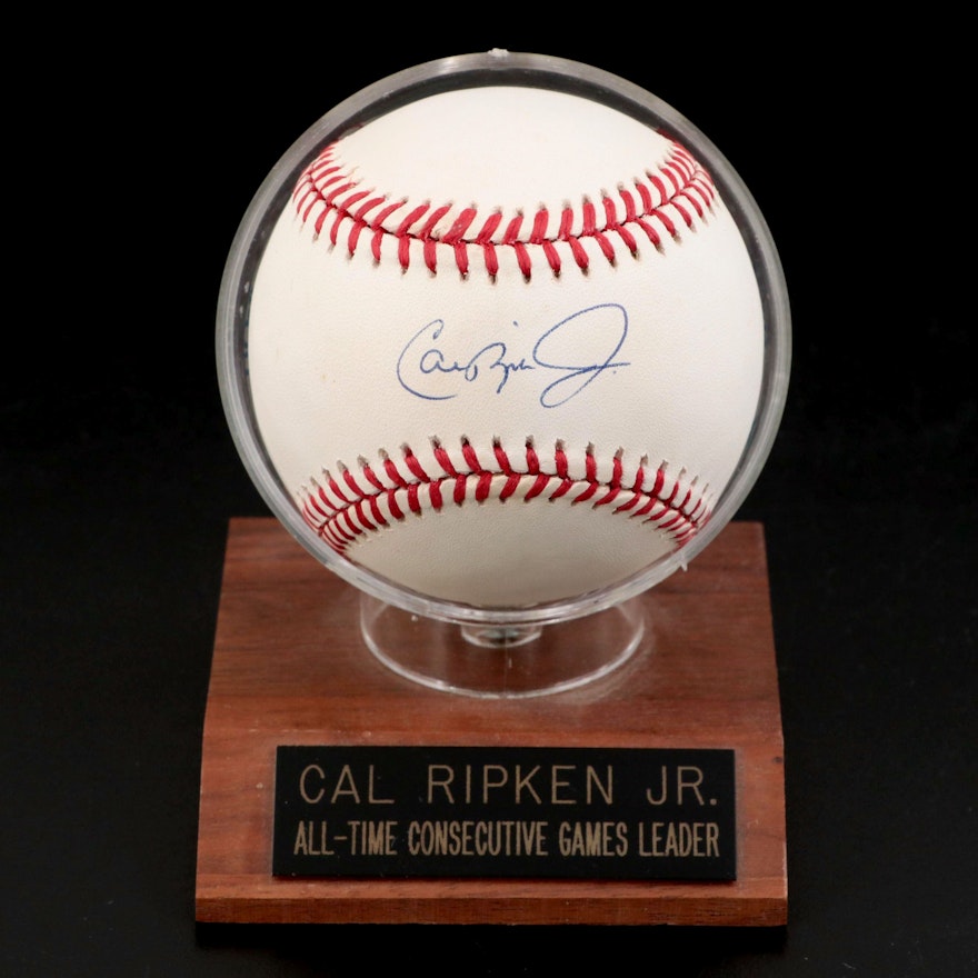 Ripken Jr. Signed Rawlings Baseball on "All-Time Consecutive Games Leader" Stand