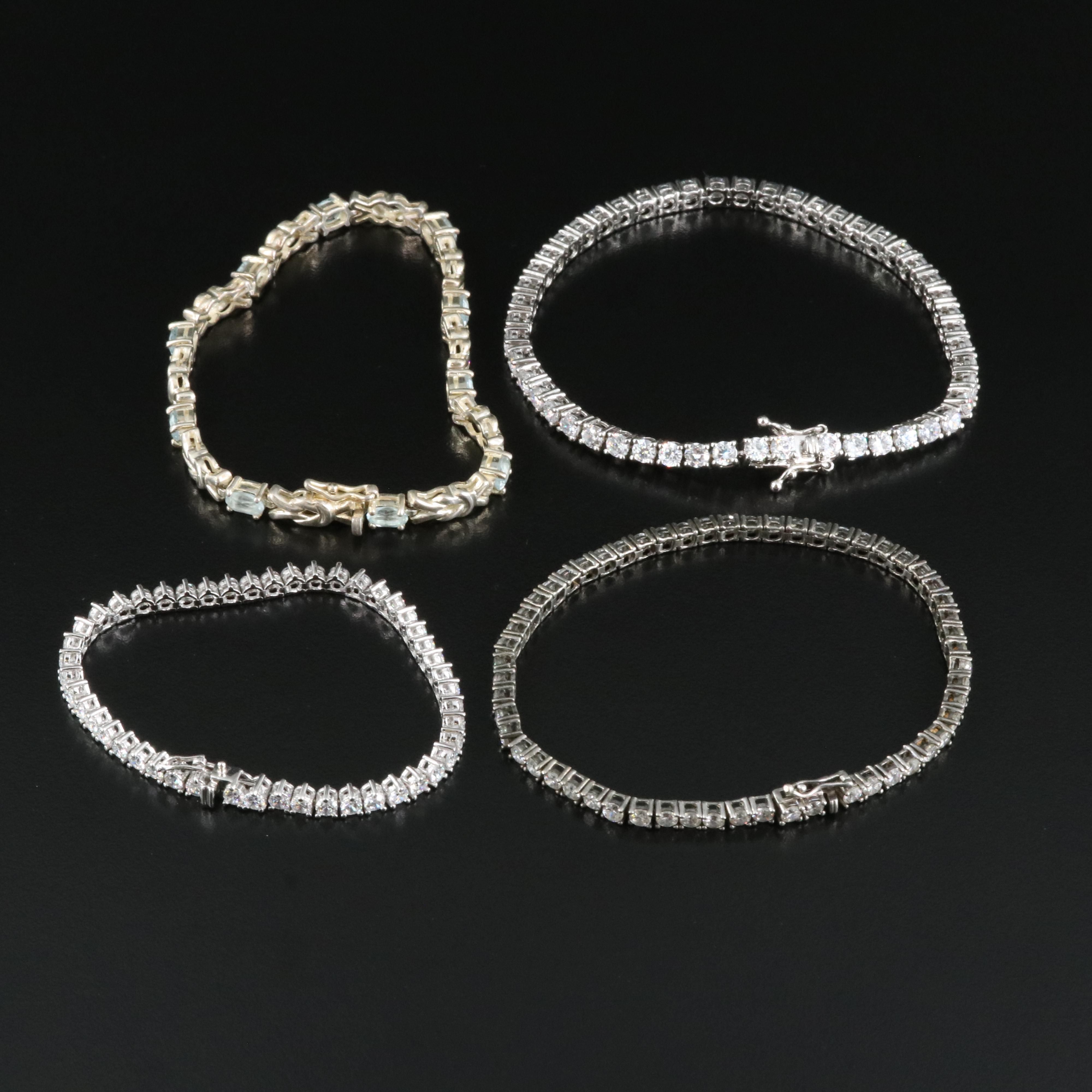 Sterling Bracelets Including Sky Blue Topaz and Cubic Zirconia