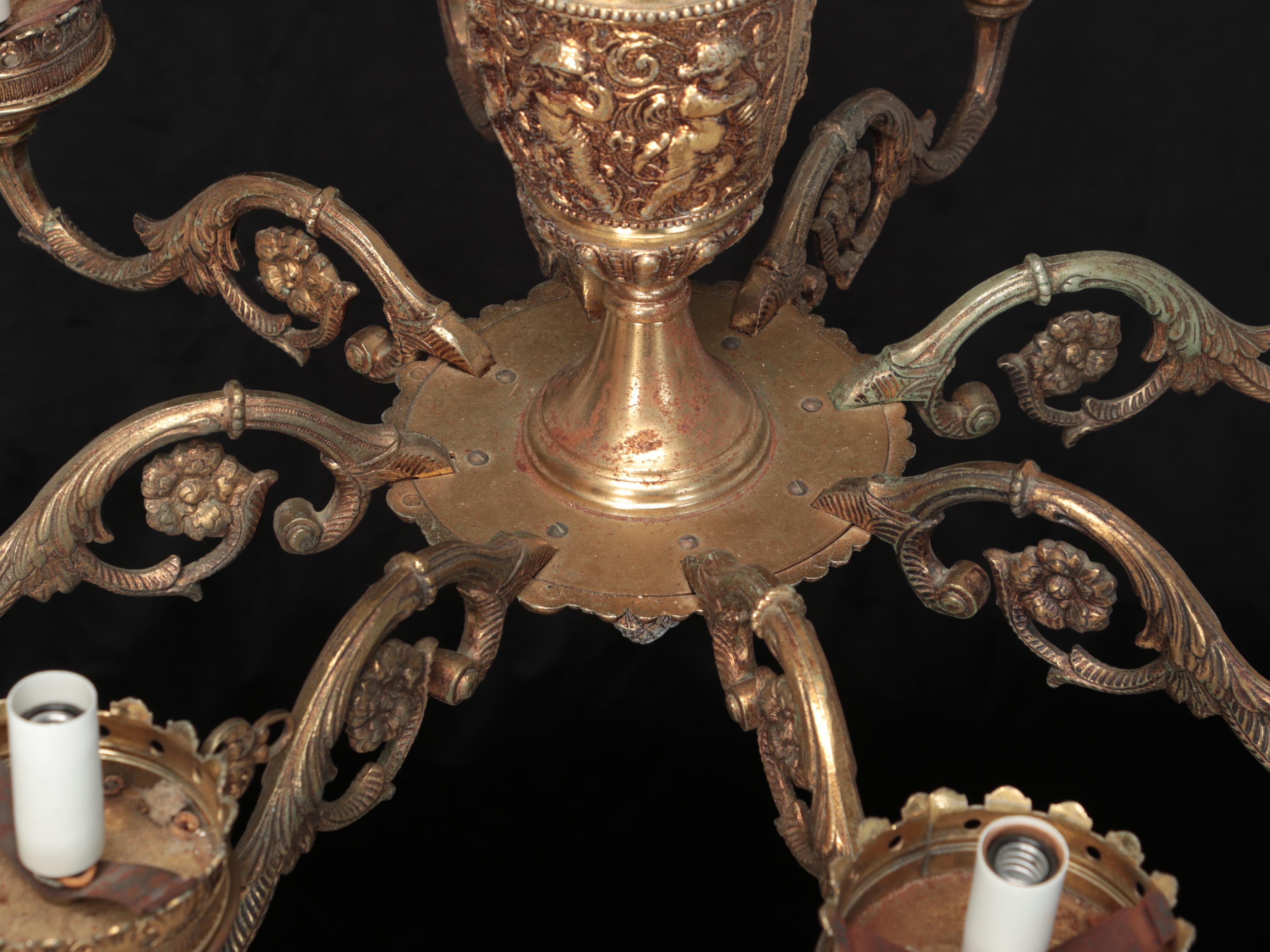 Victorian Baroque Style Putti Relief Gilt Metal Eight-Arm Chandelier