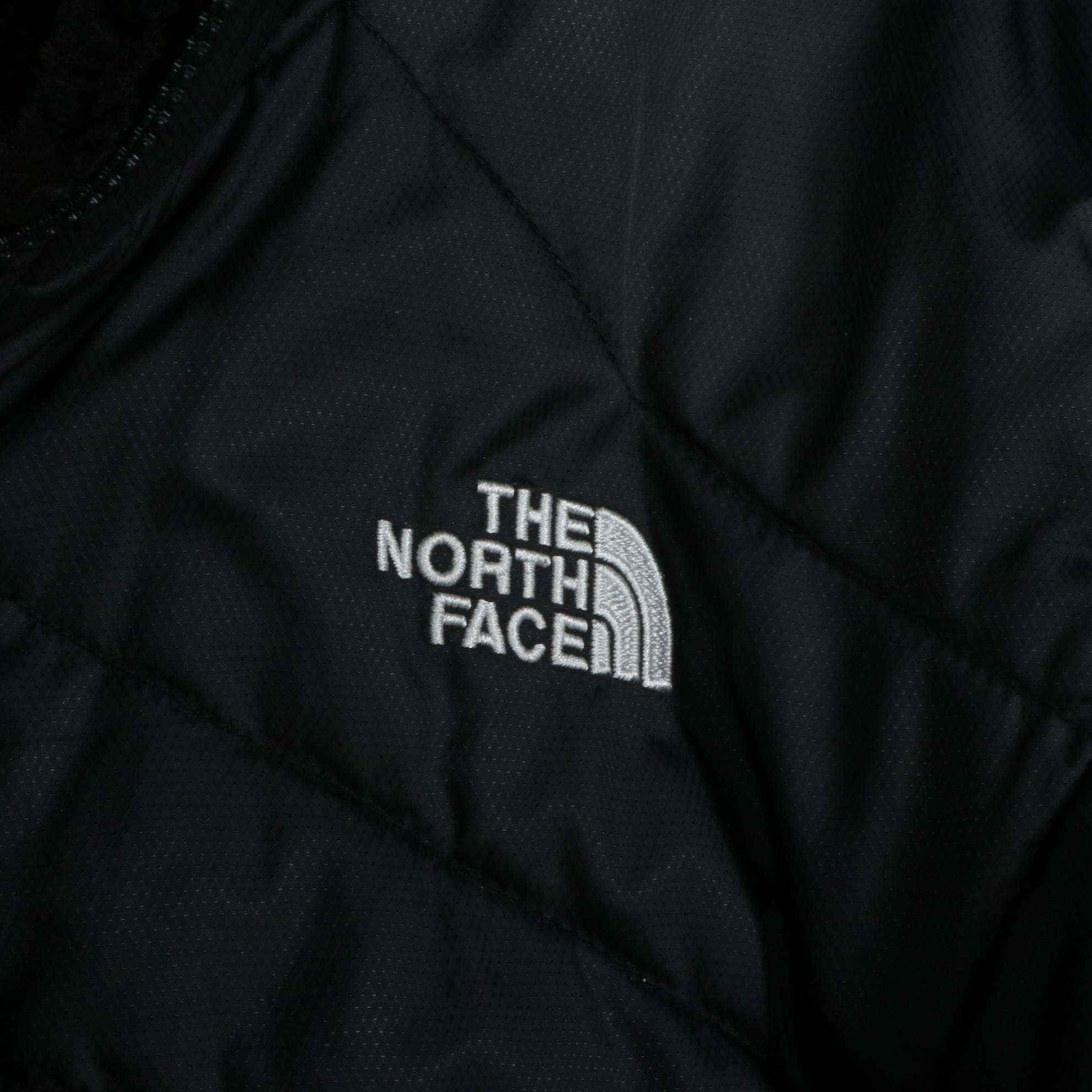 The North Face Reversible Vest and Coat in Nylon and Faux Shearling