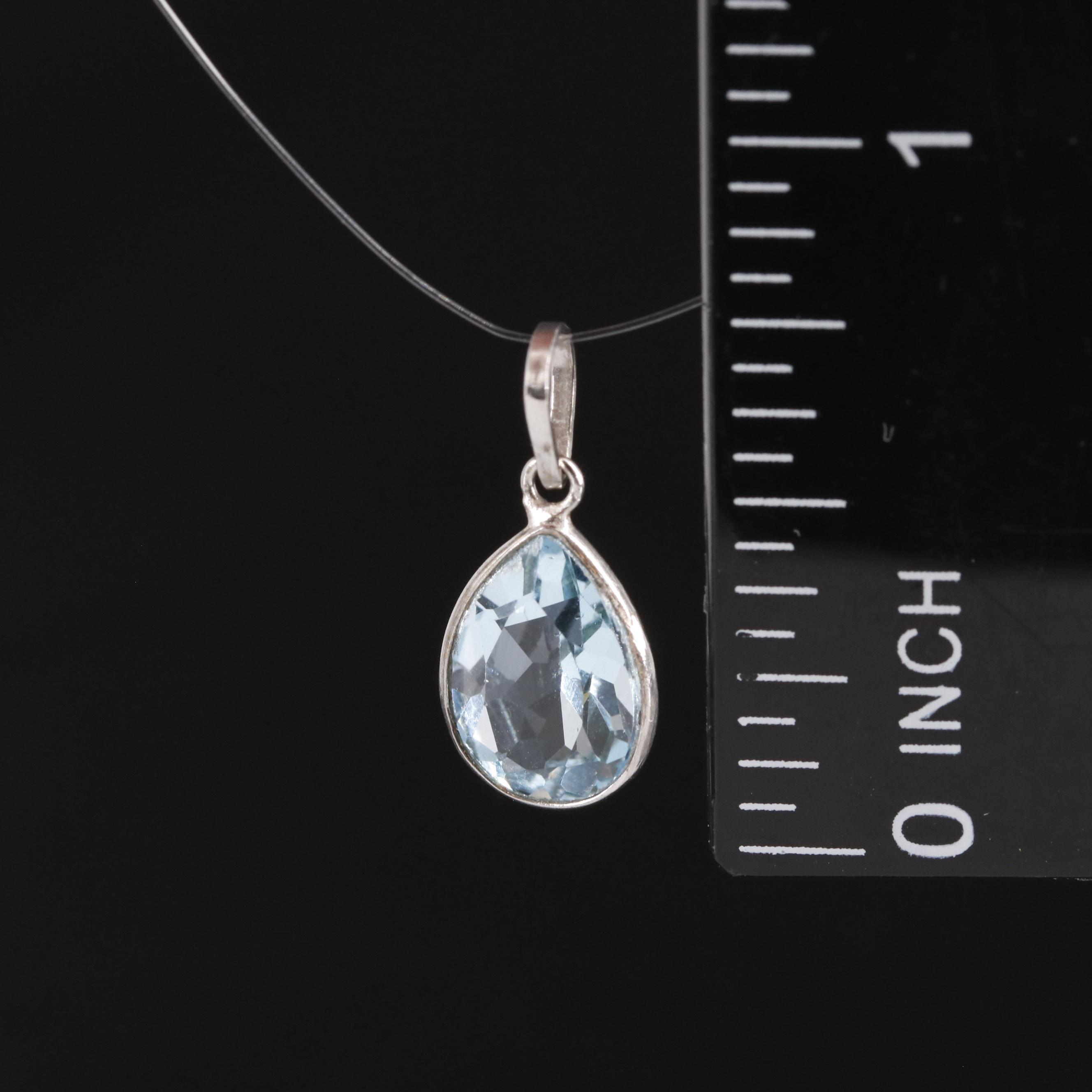 14K Blue Topaz Pendant