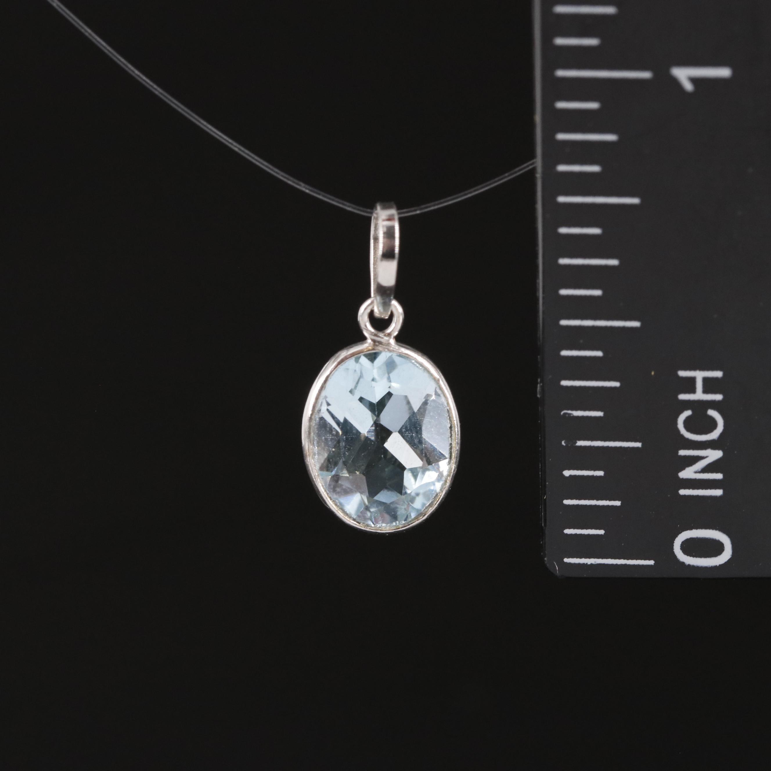 14K Blue Topaz Pendant
