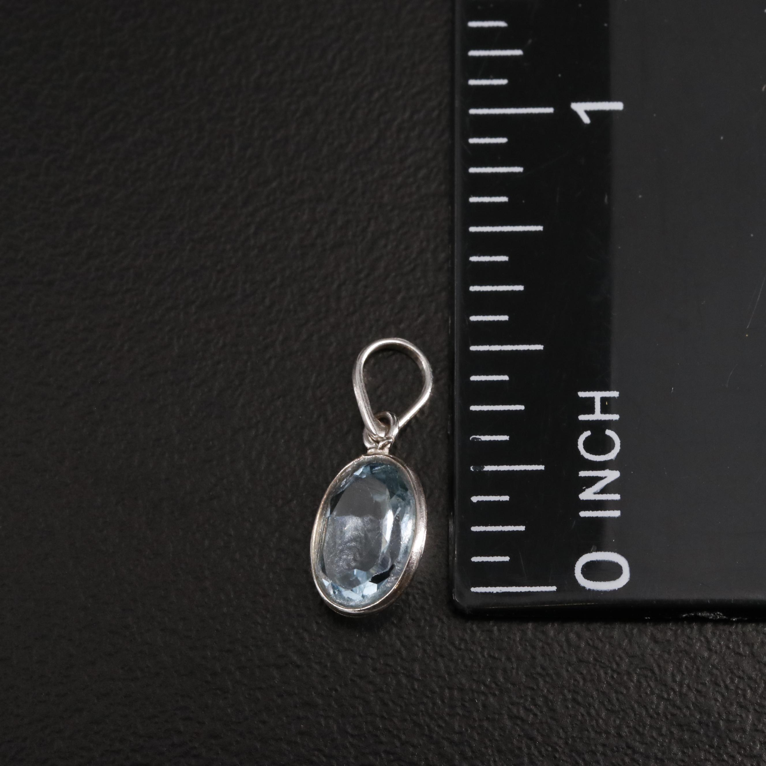 14K Blue Topaz Pendant