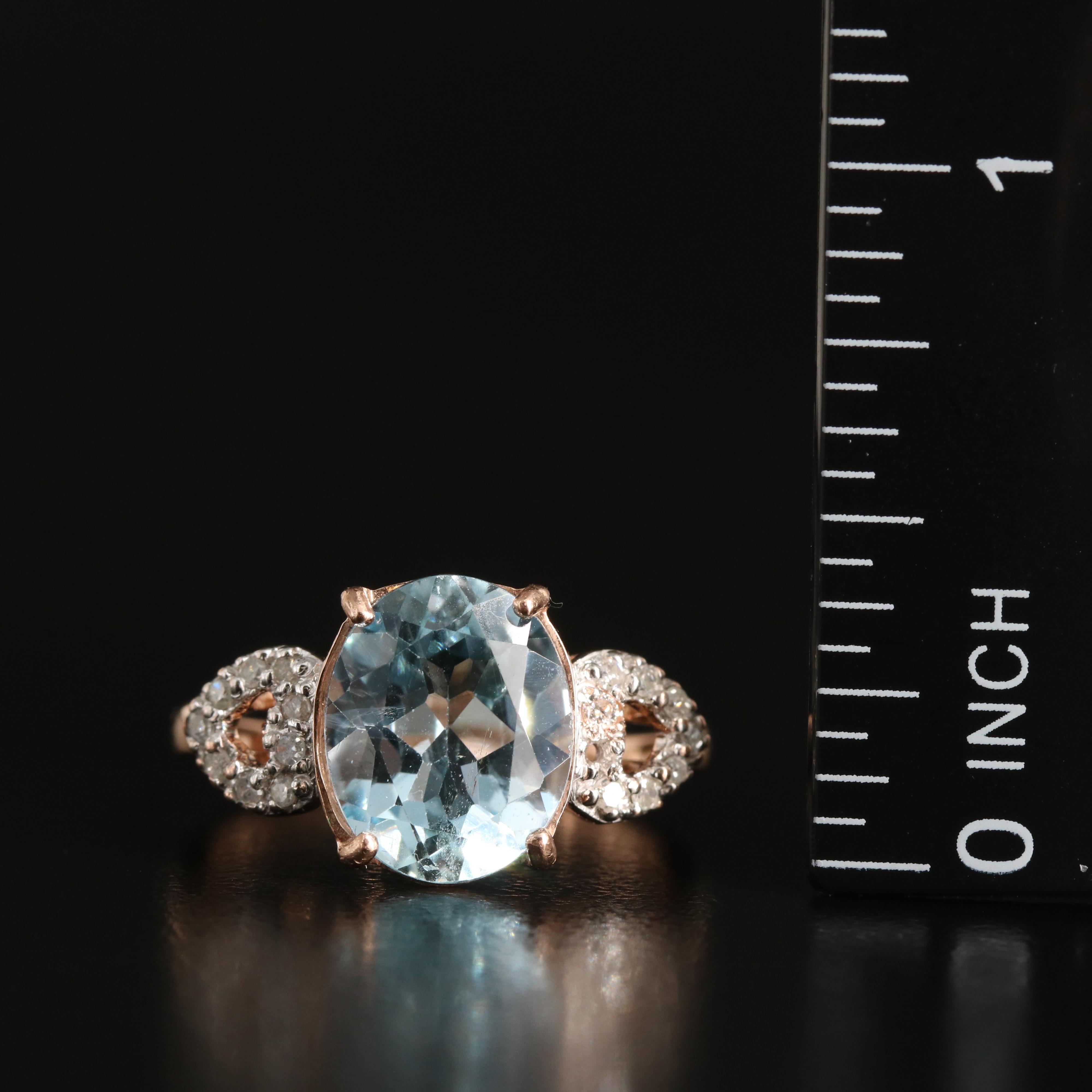 14K Rose Gold Sky Blue Topaz and Diamond Ring with Heart Shoulders