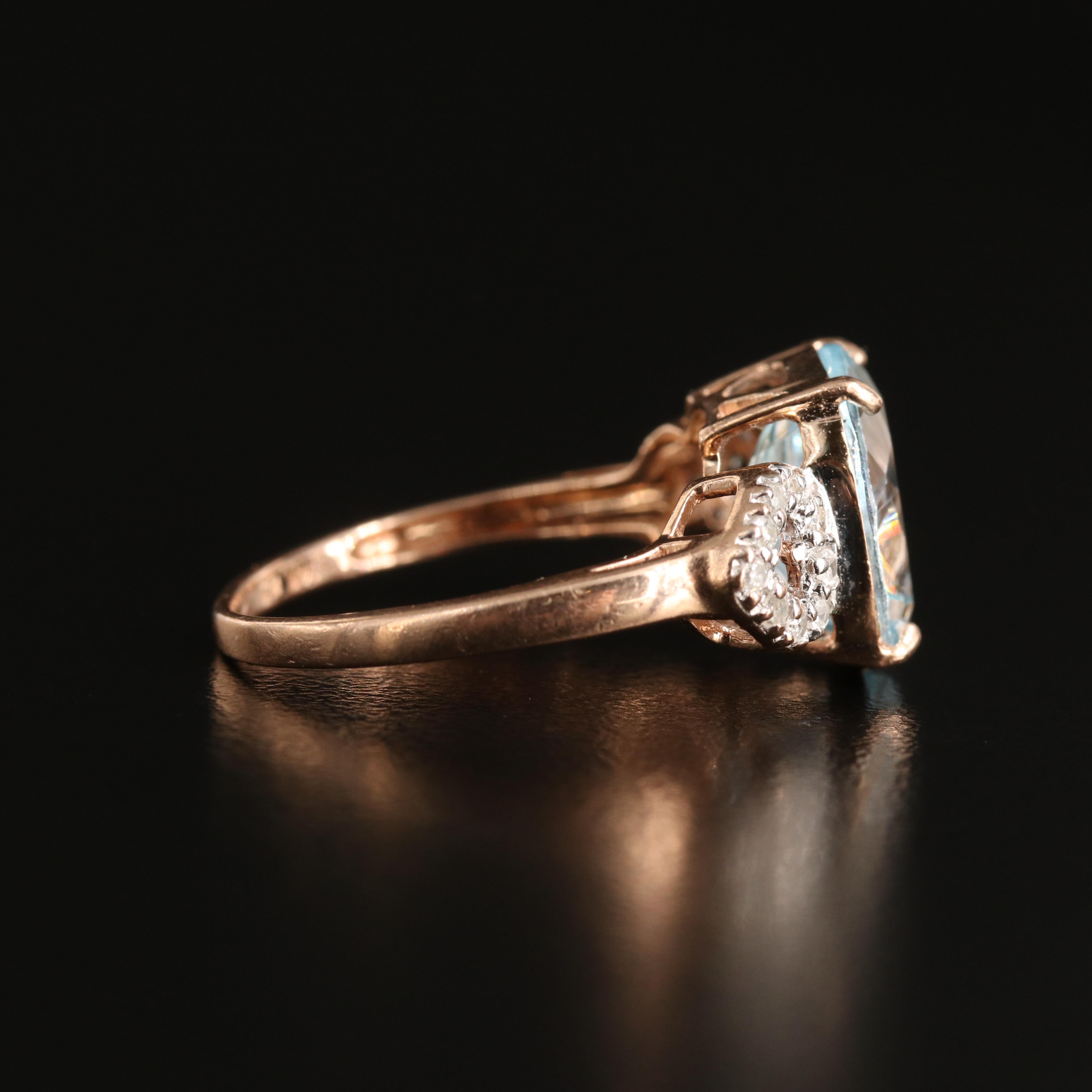 14K Rose Gold Sky Blue Topaz and Diamond Ring with Heart Shoulders