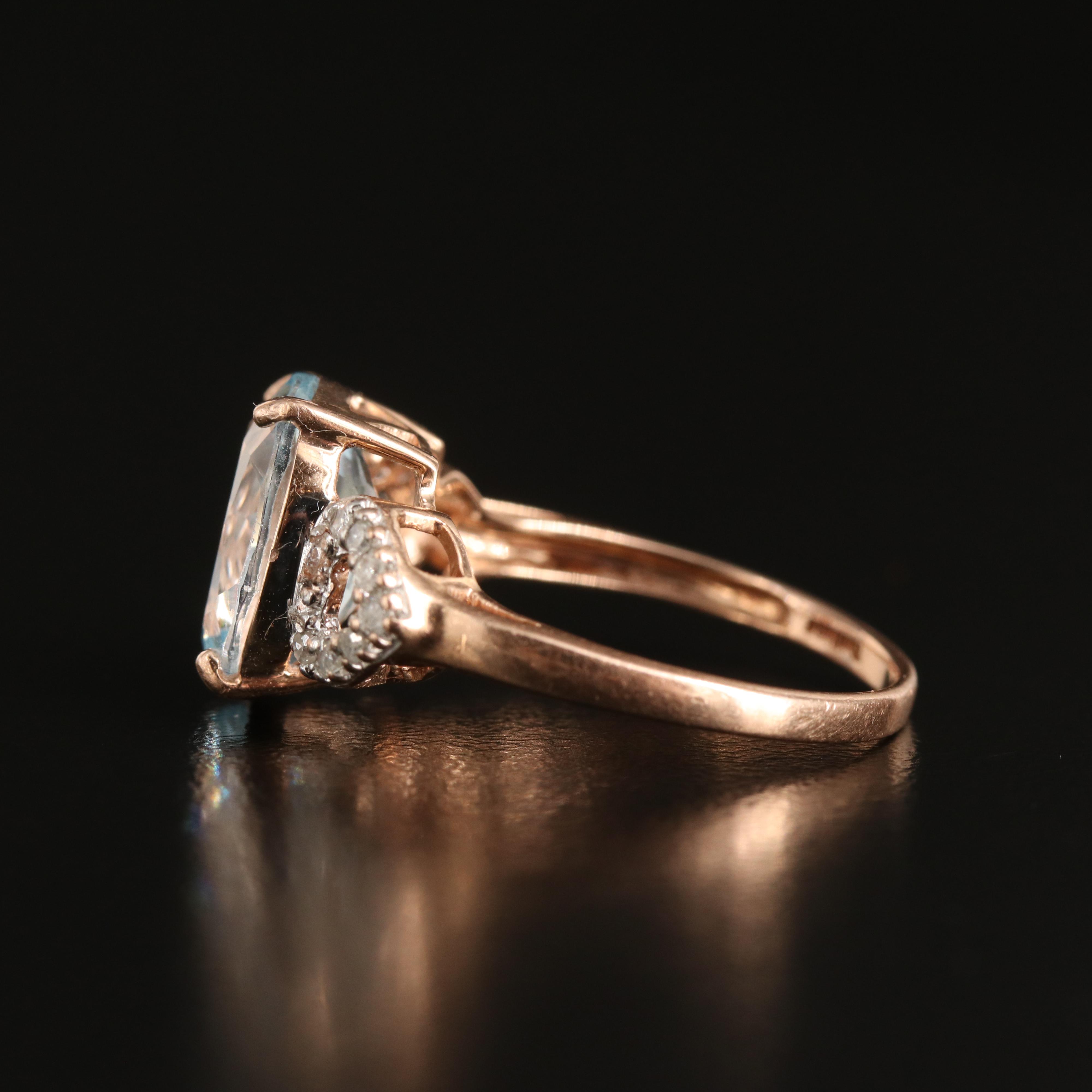 14K Rose Gold Sky Blue Topaz and Diamond Ring with Heart Shoulders