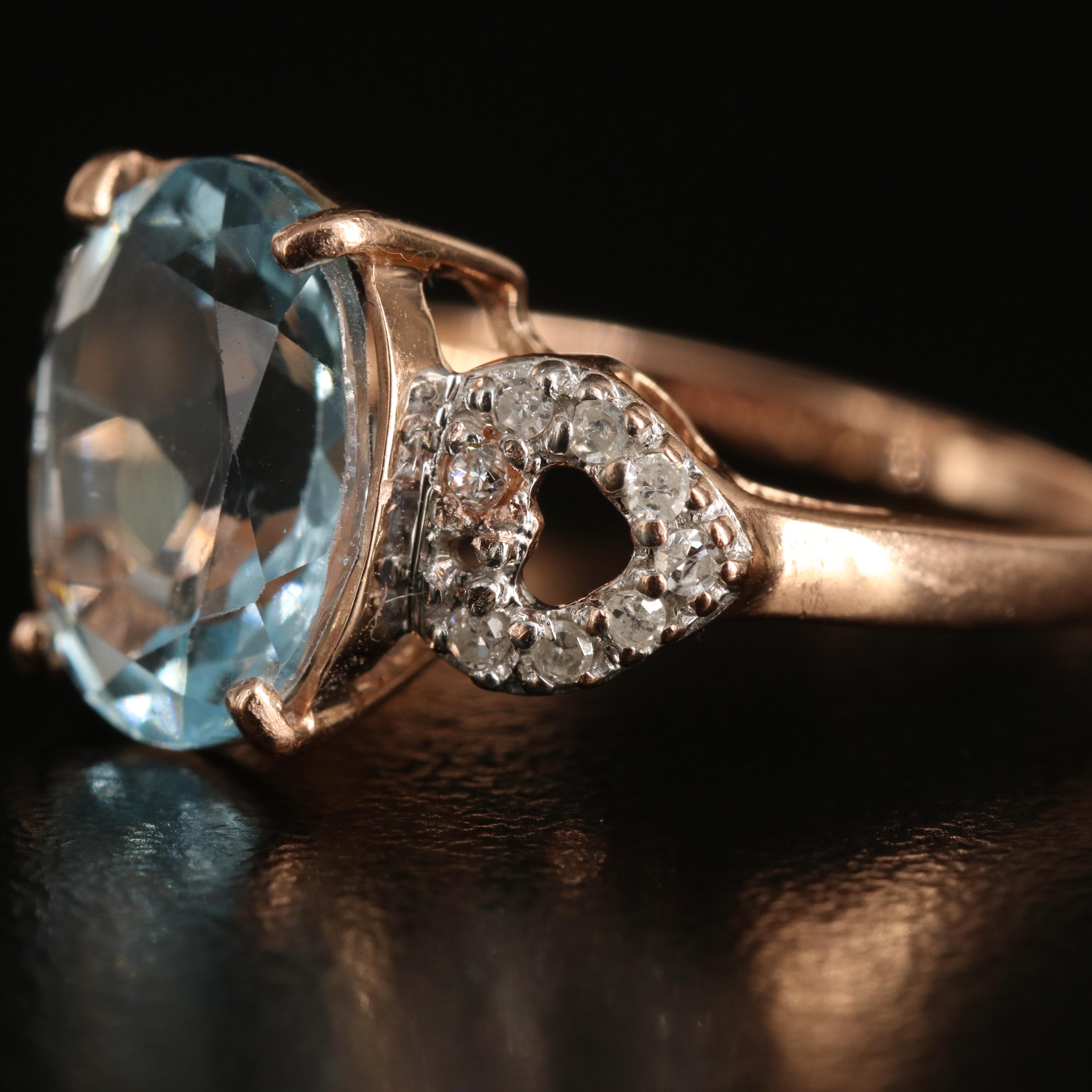 14K Rose Gold Sky Blue Topaz and Diamond Ring with Heart Shoulders