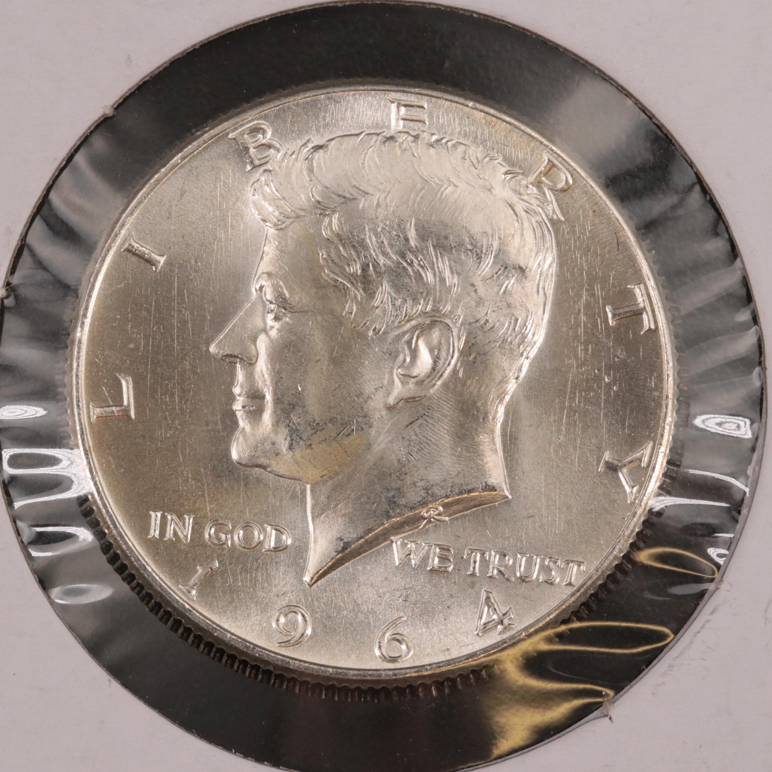 Two Uncirculated Silver Kennedy Half Dollars and 2010-D Hot Springs Quarter