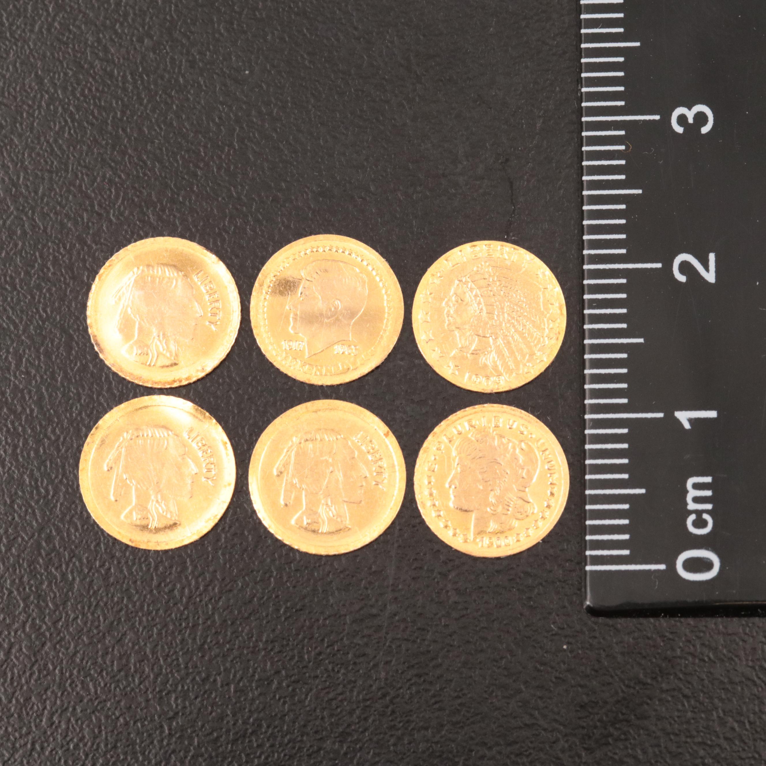 Six Tiny Gold-Plated Replica Coins