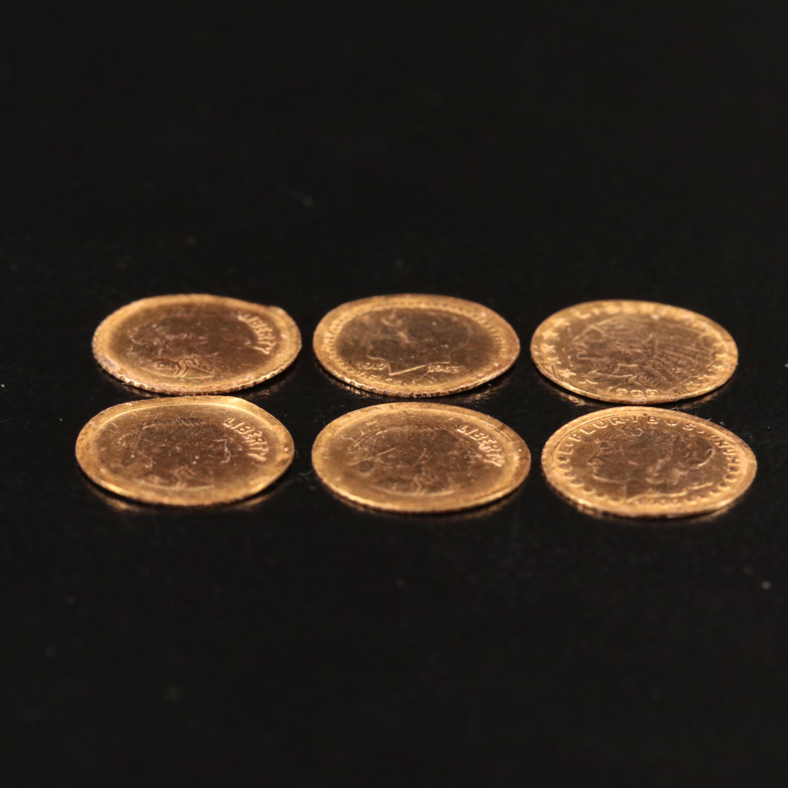 Six Tiny Gold-Plated Replica Coins