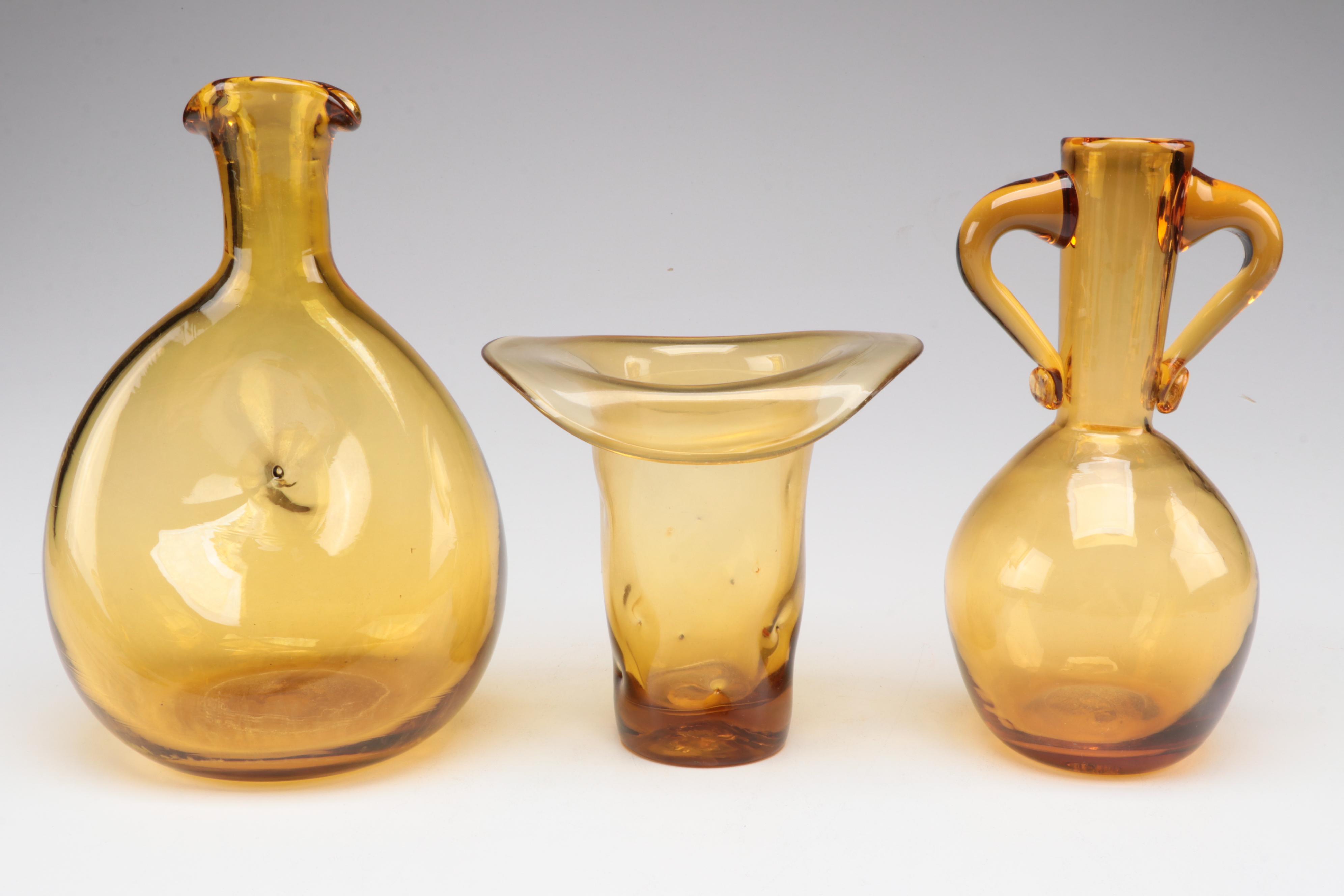 Mid Century Modern Style Amber Glass Candlesticks and Vases, Mid to Late 20th C.