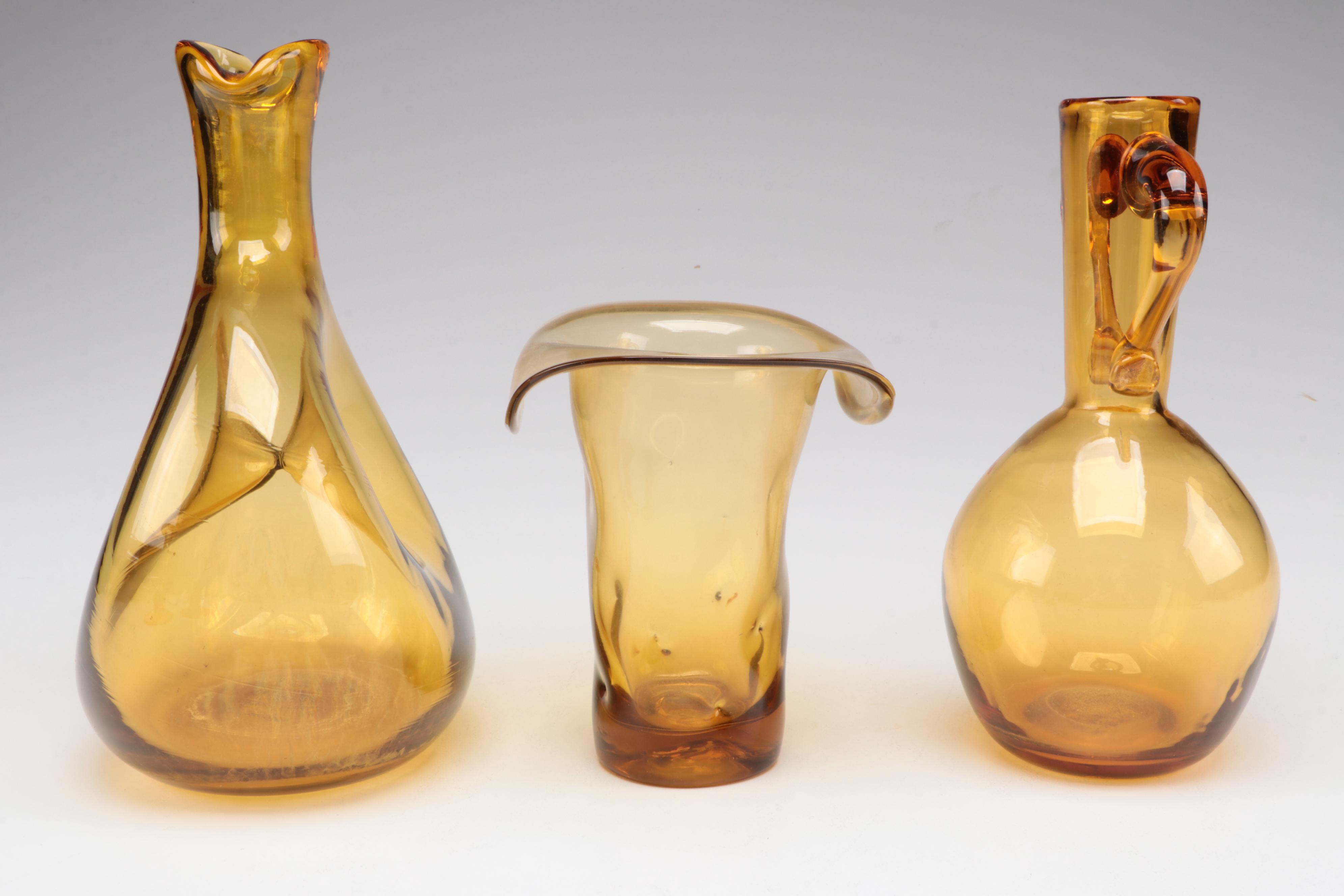 Mid Century Modern Style Amber Glass Candlesticks and Vases, Mid to Late 20th C.