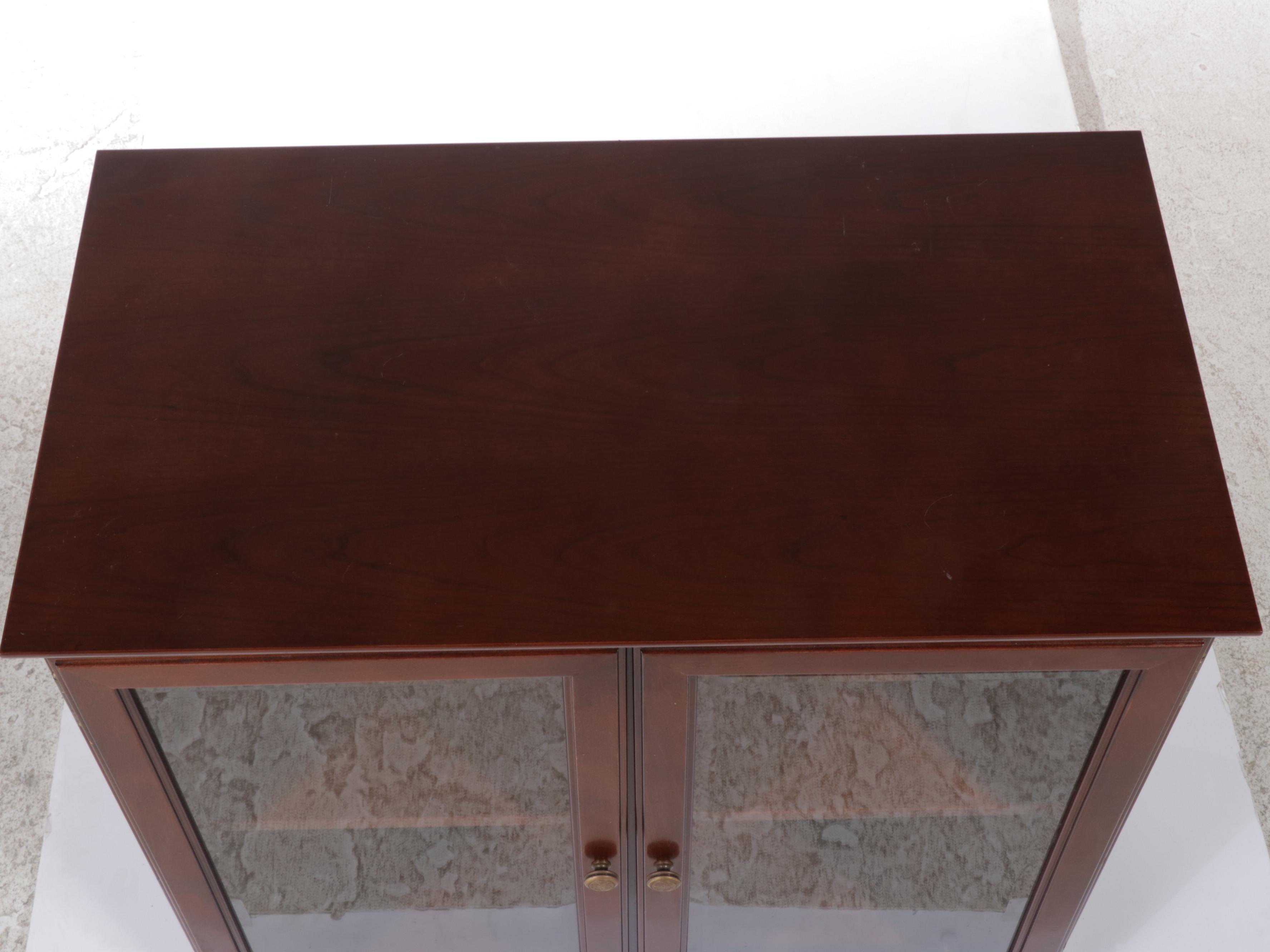 The Bombay Company Cherrywood-Stained Display Cabinet