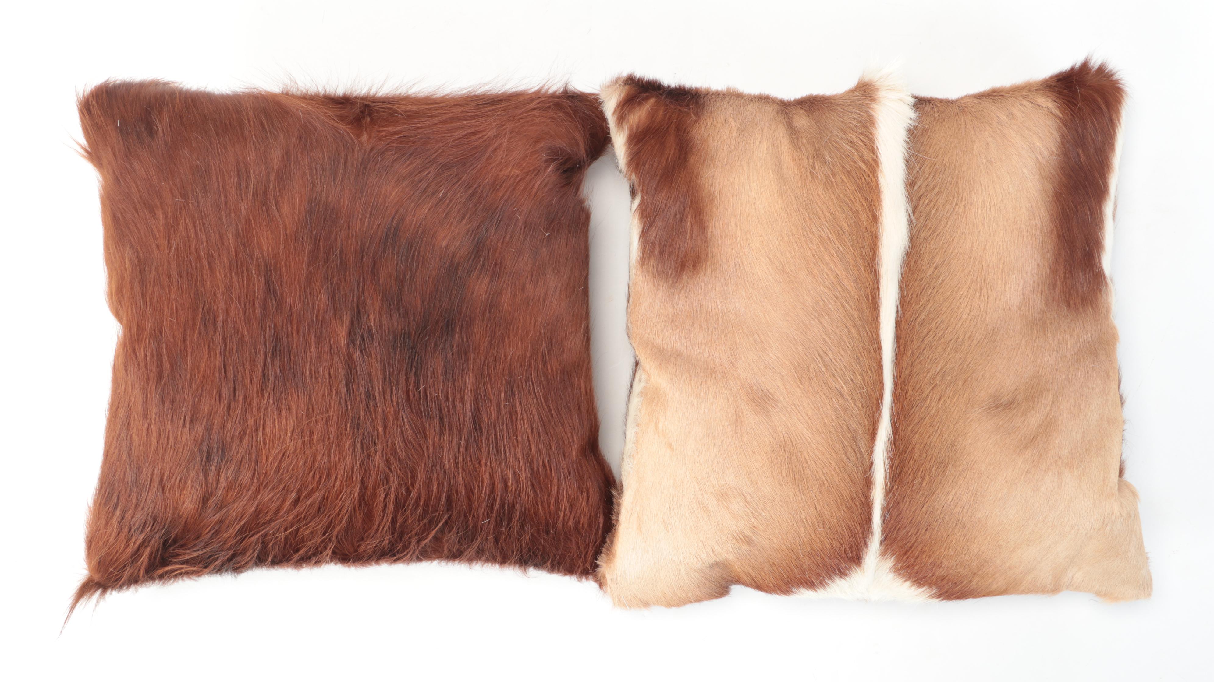 Goat and Springbok Pelt Accent Pillows and Grant's Gazelle Throw Rug