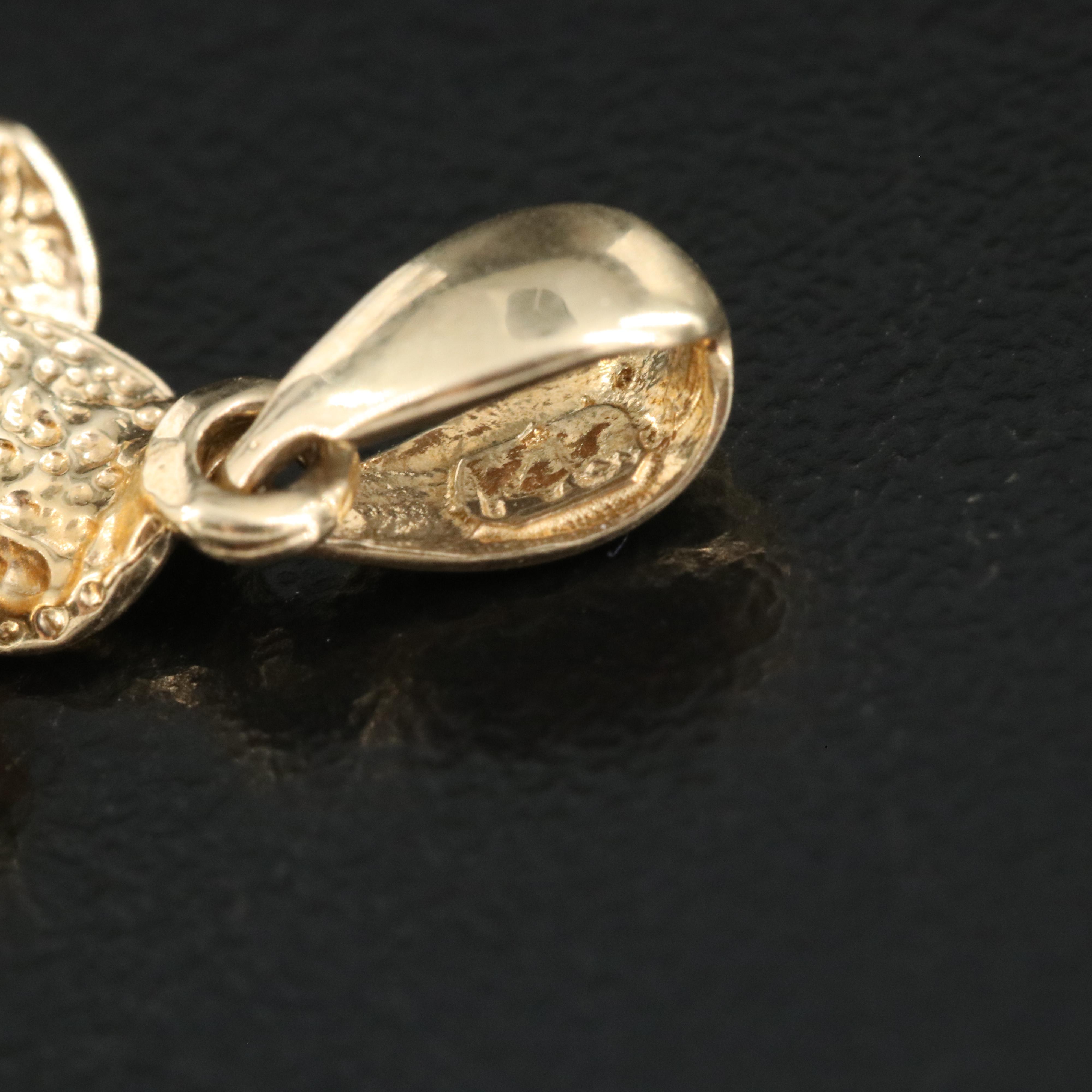 14K 0.03 CT Diamond Plumeria Pendant