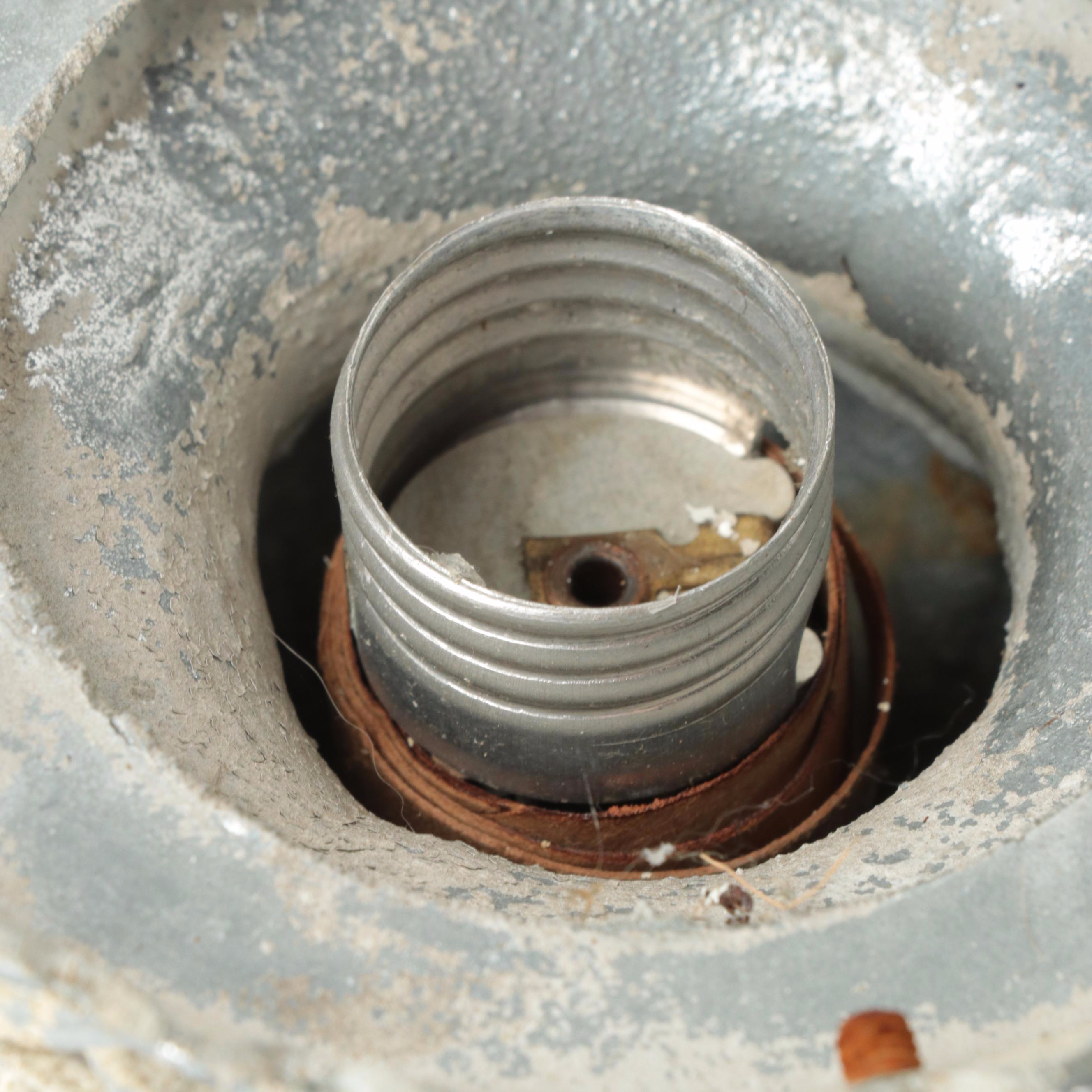 Pair of Painted Cast Metal Winged Caryatid Light Brackets