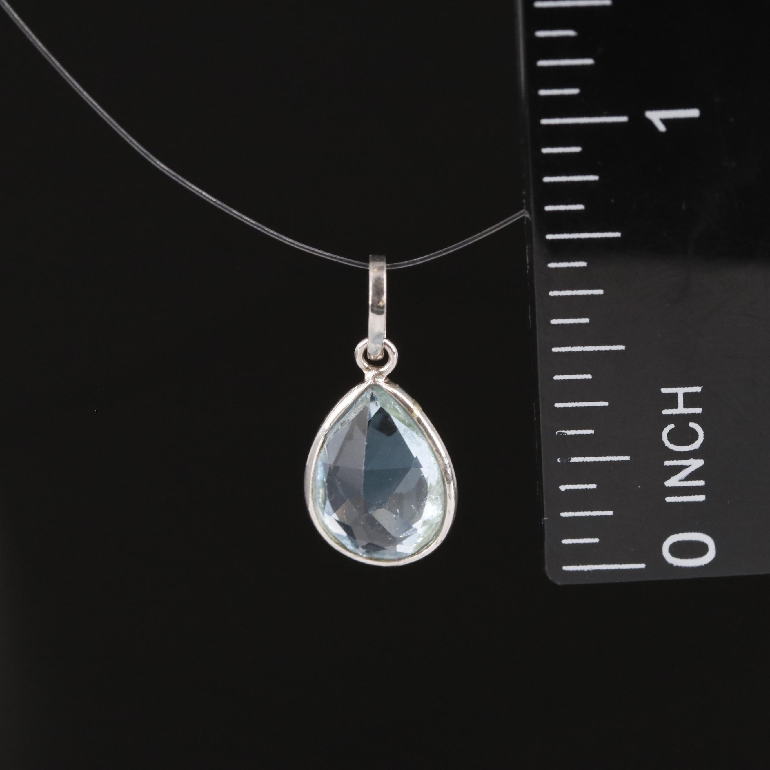 14K Blue Topaz Pendant