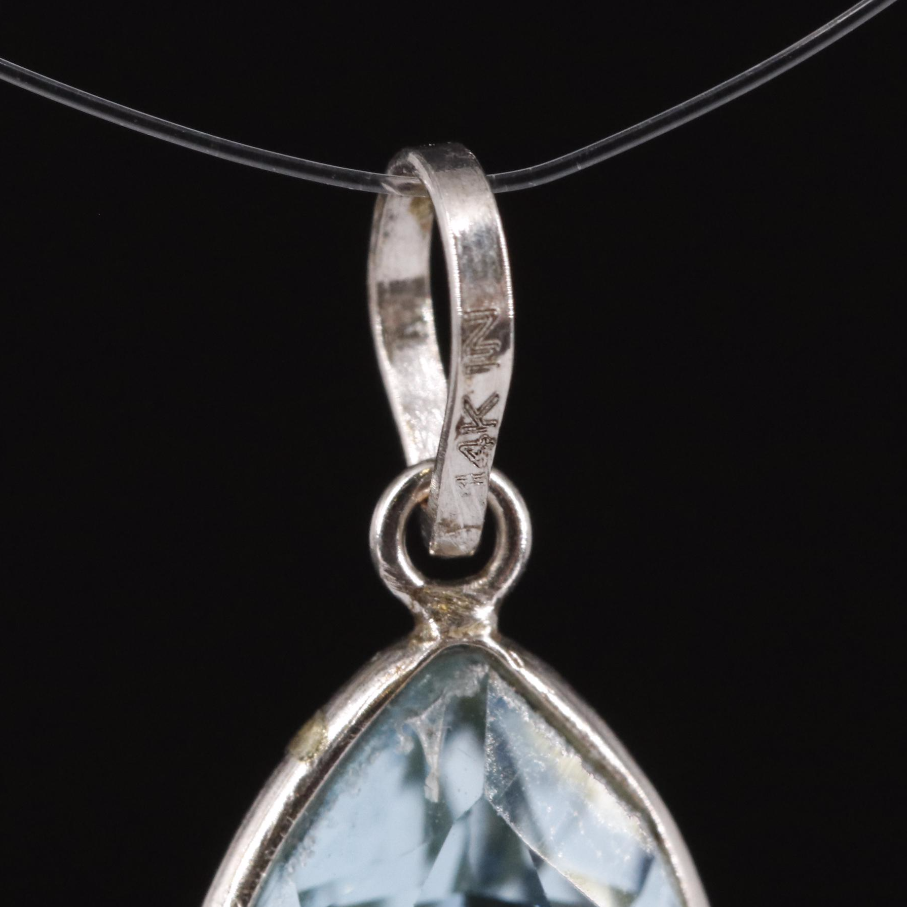 14K Blue Topaz Pendant