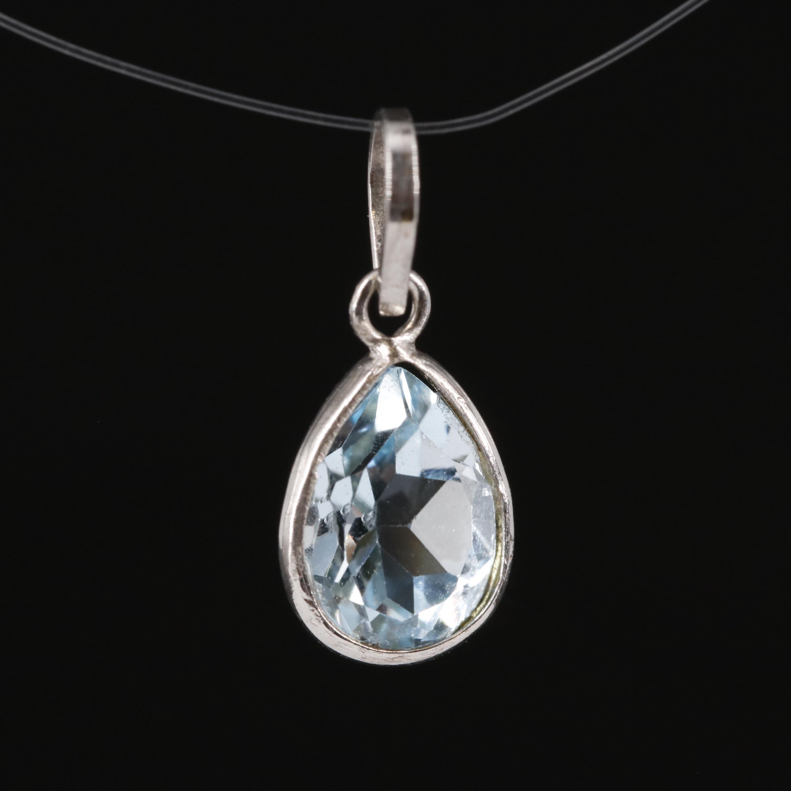 14K Blue Topaz Pendant