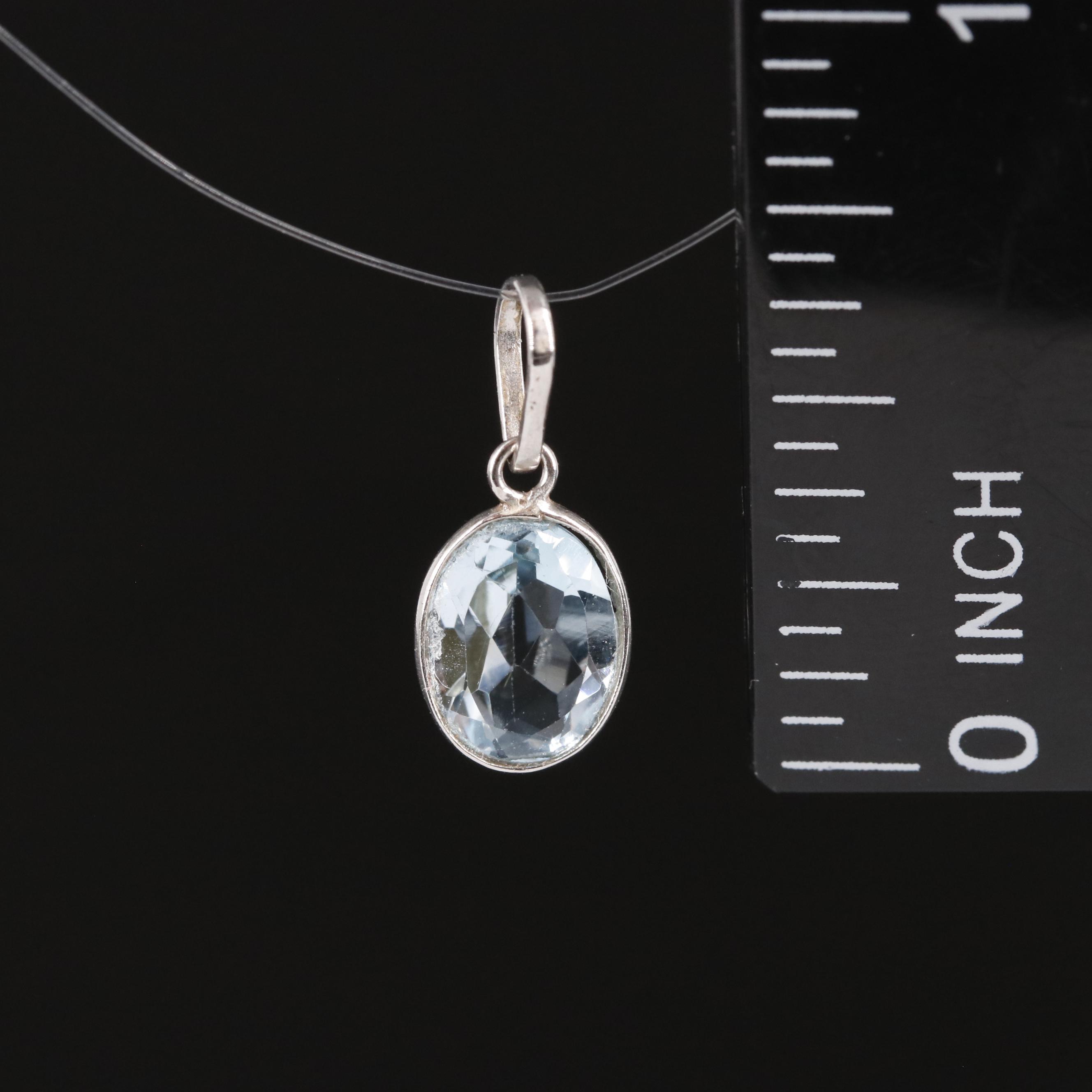 14K Blue Topaz Pendant