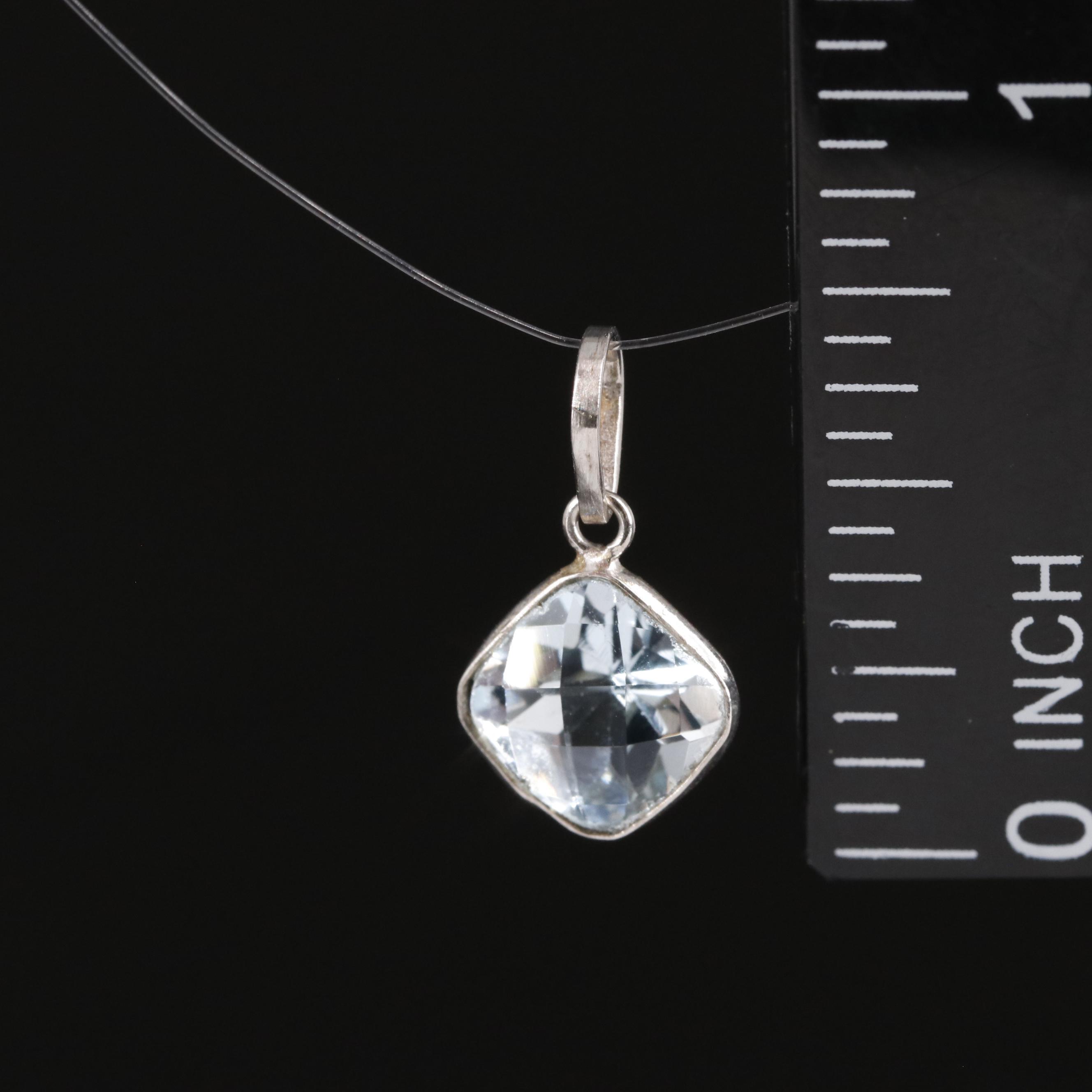 14K Blue Topaz Pendant
