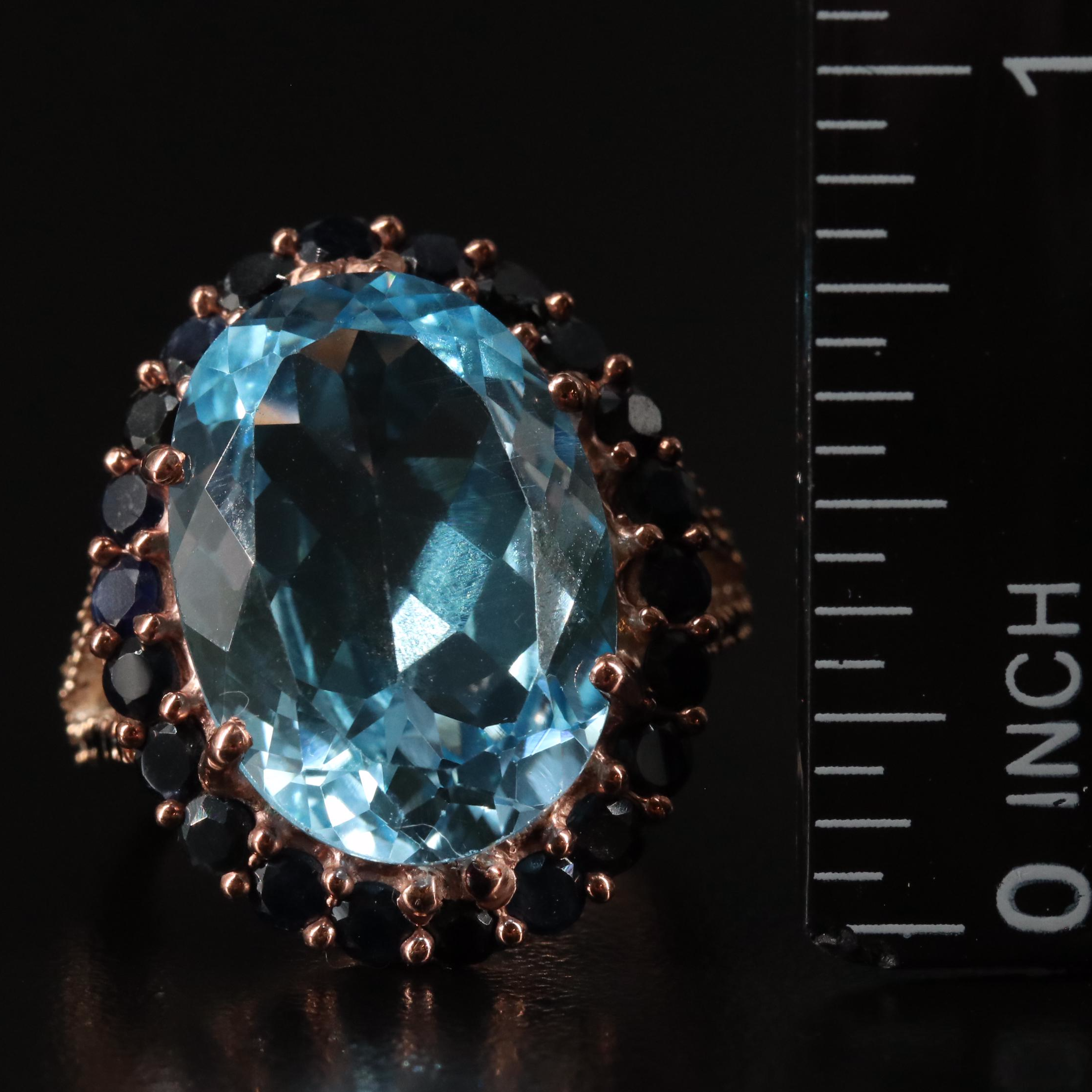 Sterling Blue Topaz and Sapphire Halo Ring