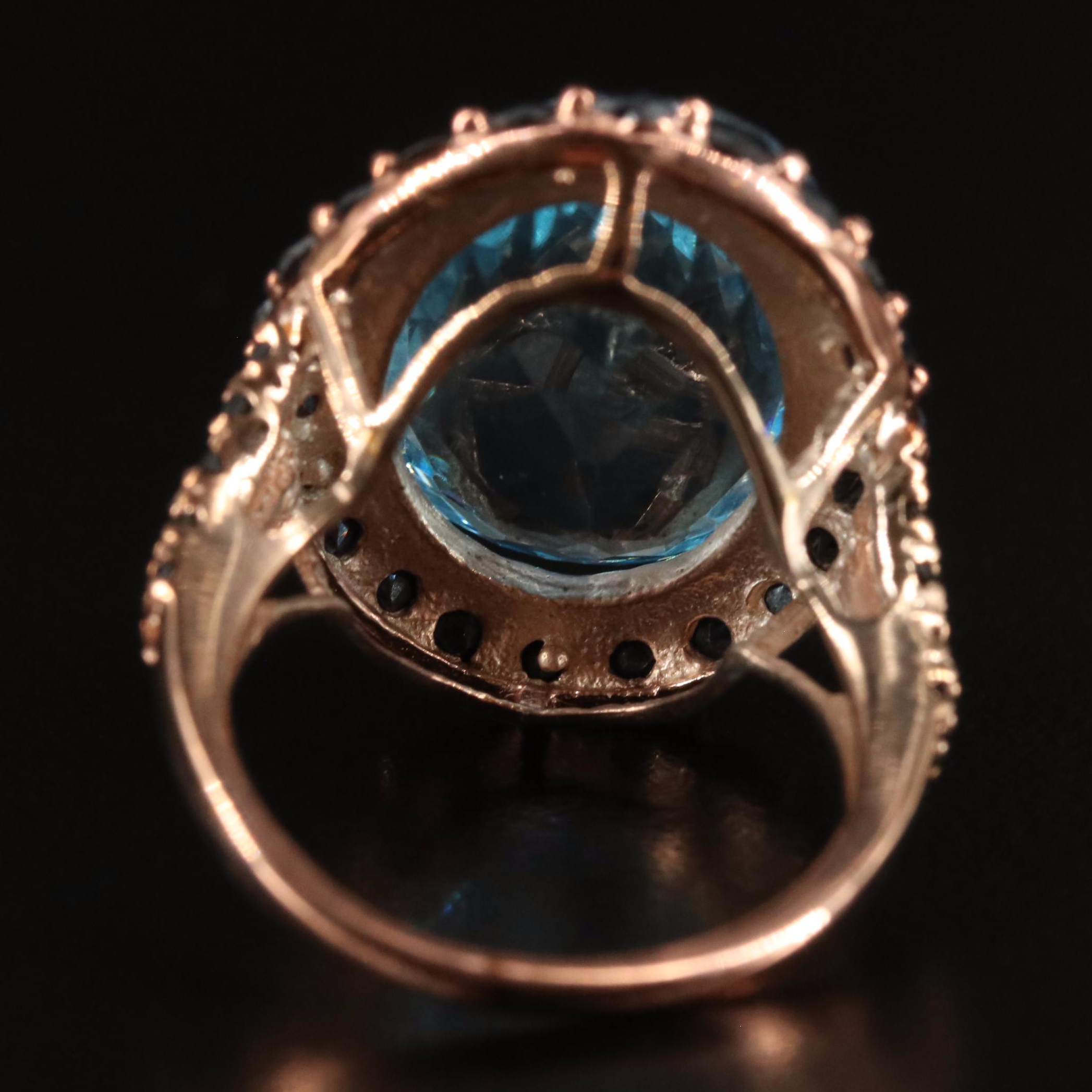 Sterling Blue Topaz and Sapphire Halo Ring