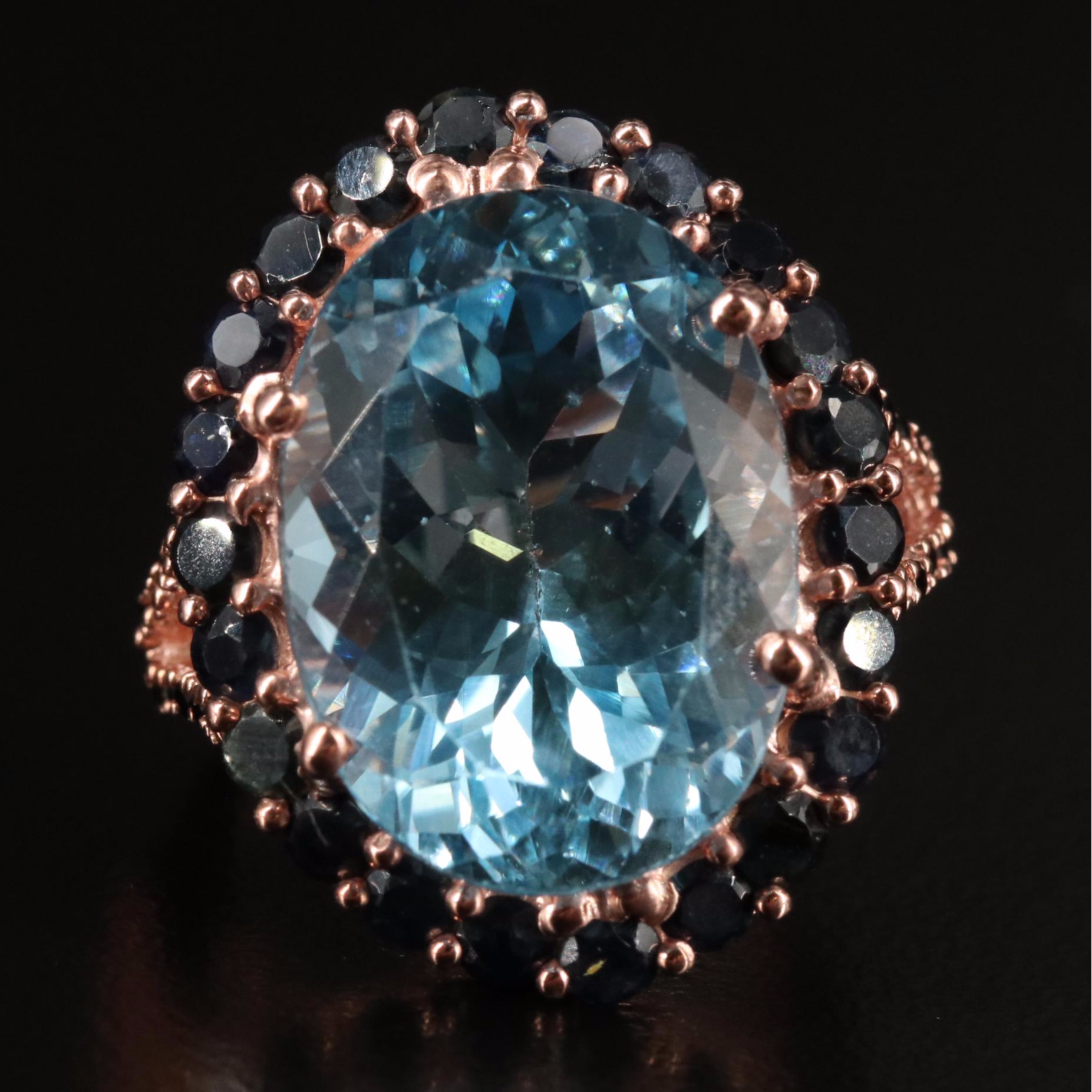 Sterling Blue Topaz and Sapphire Halo Ring