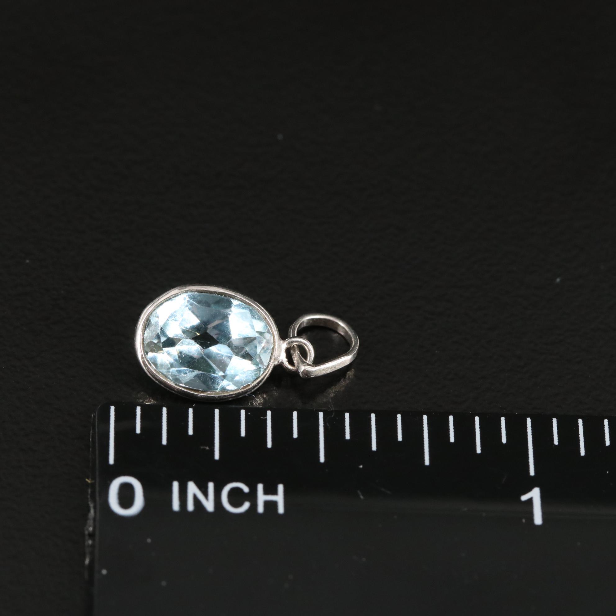 14K Blue Topaz Pendant