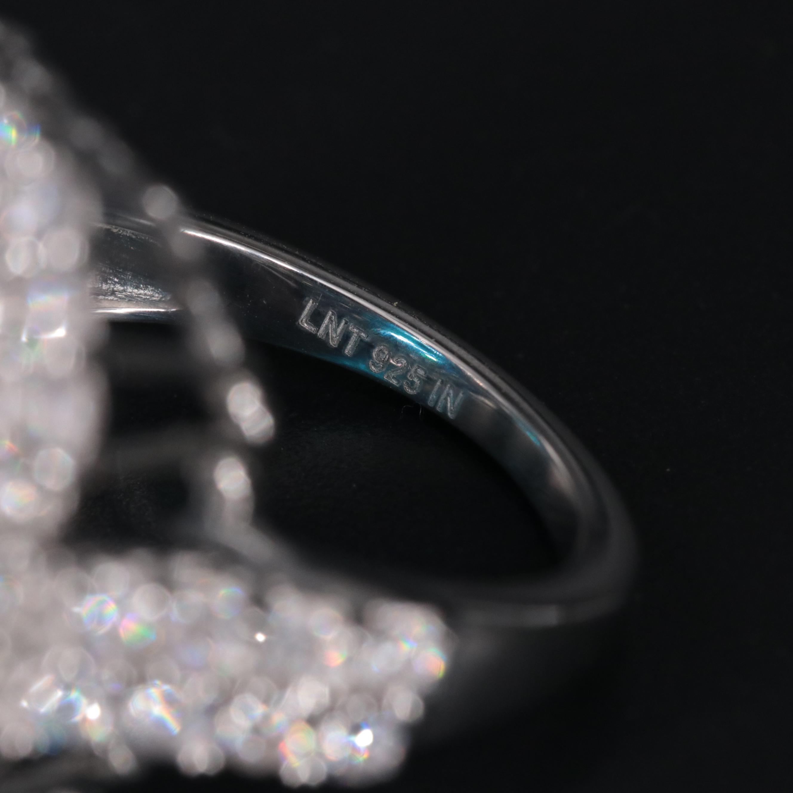 Sterling Silver Topaz and Cubic Zirconia Ring