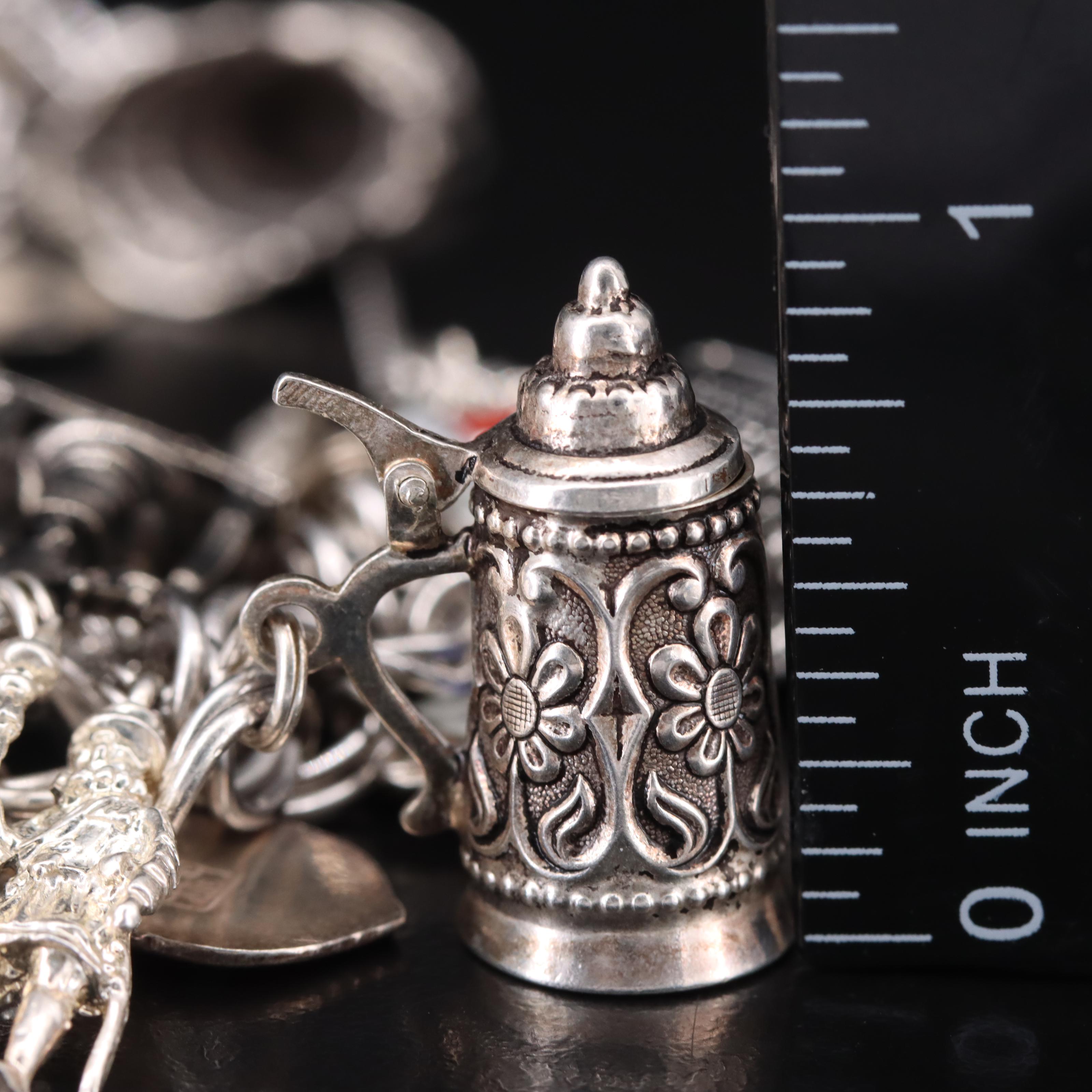 Vintage Travel Charm Bracelet Including Sterling, 835 and 800 Silver