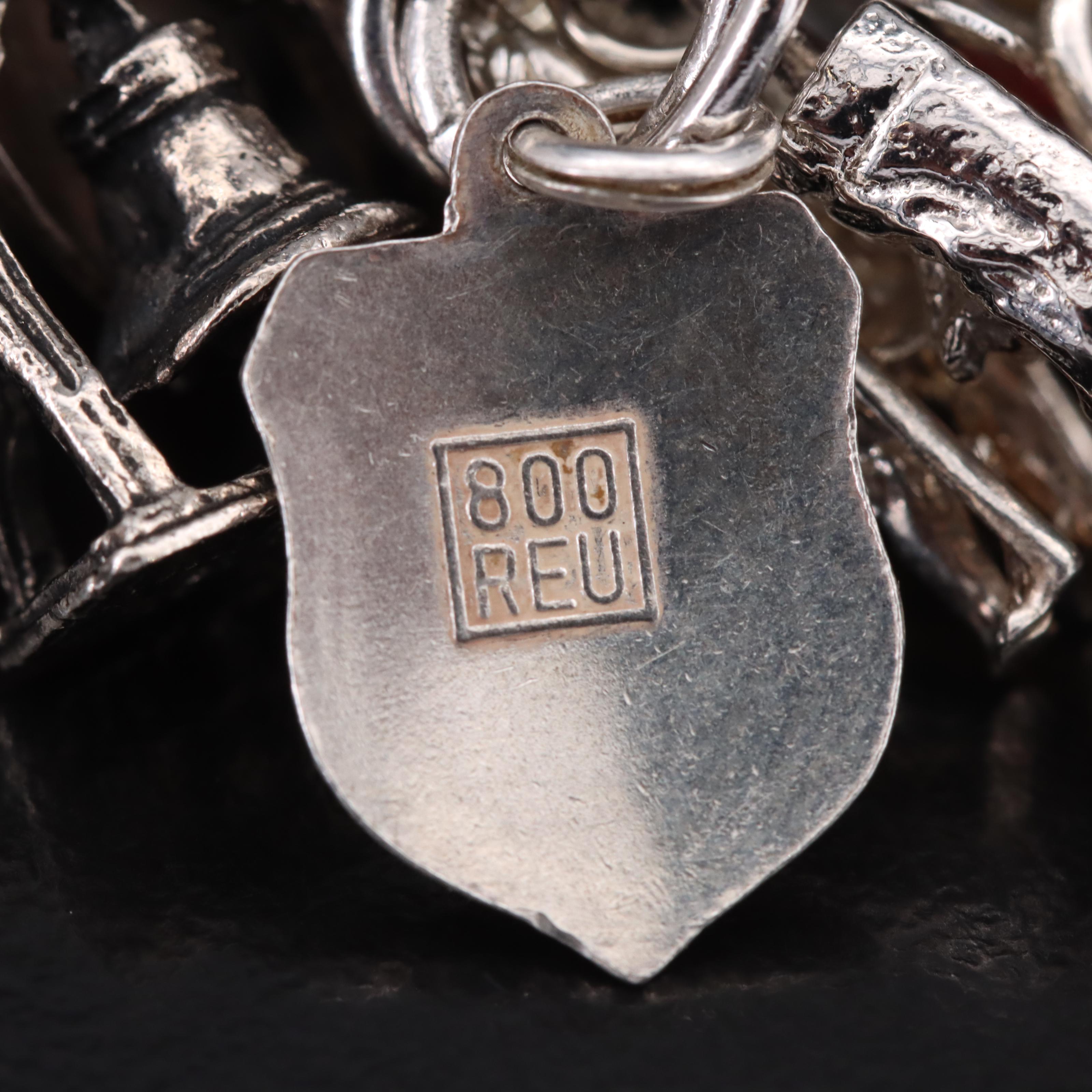 Vintage Travel Charm Bracelet Including Sterling, 835 and 800 Silver