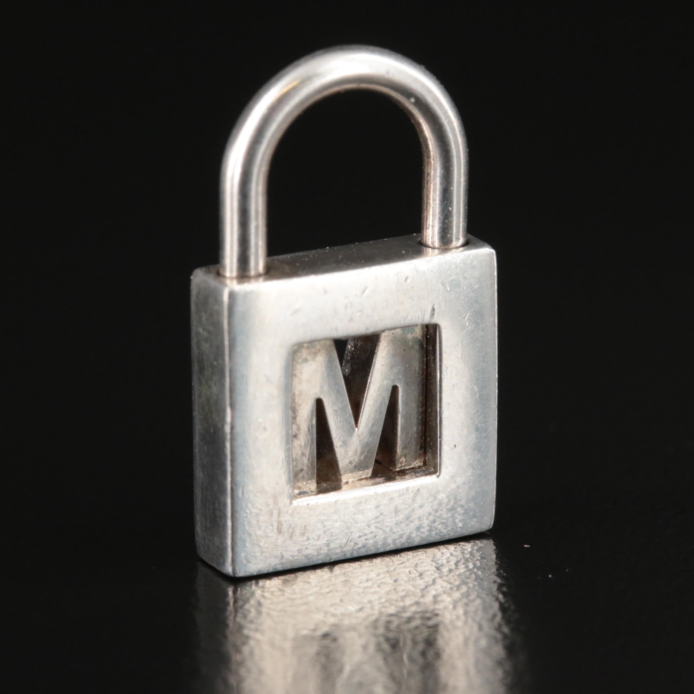 Tiffany & Co. Sterling "M" Padlock Pendant