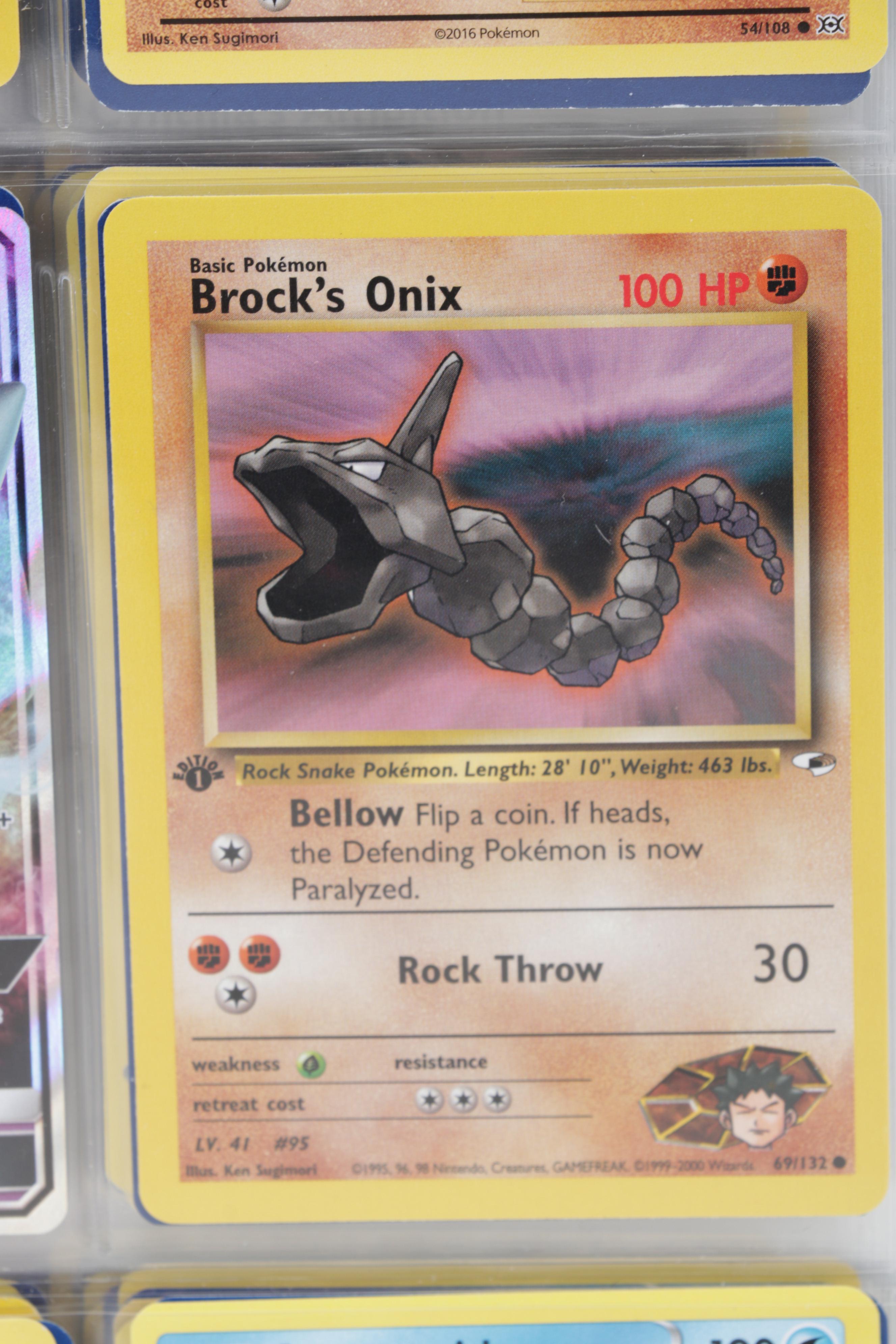 Pokémon Trading Cards Including "Feebas" and First Edition "Brock's Onix"