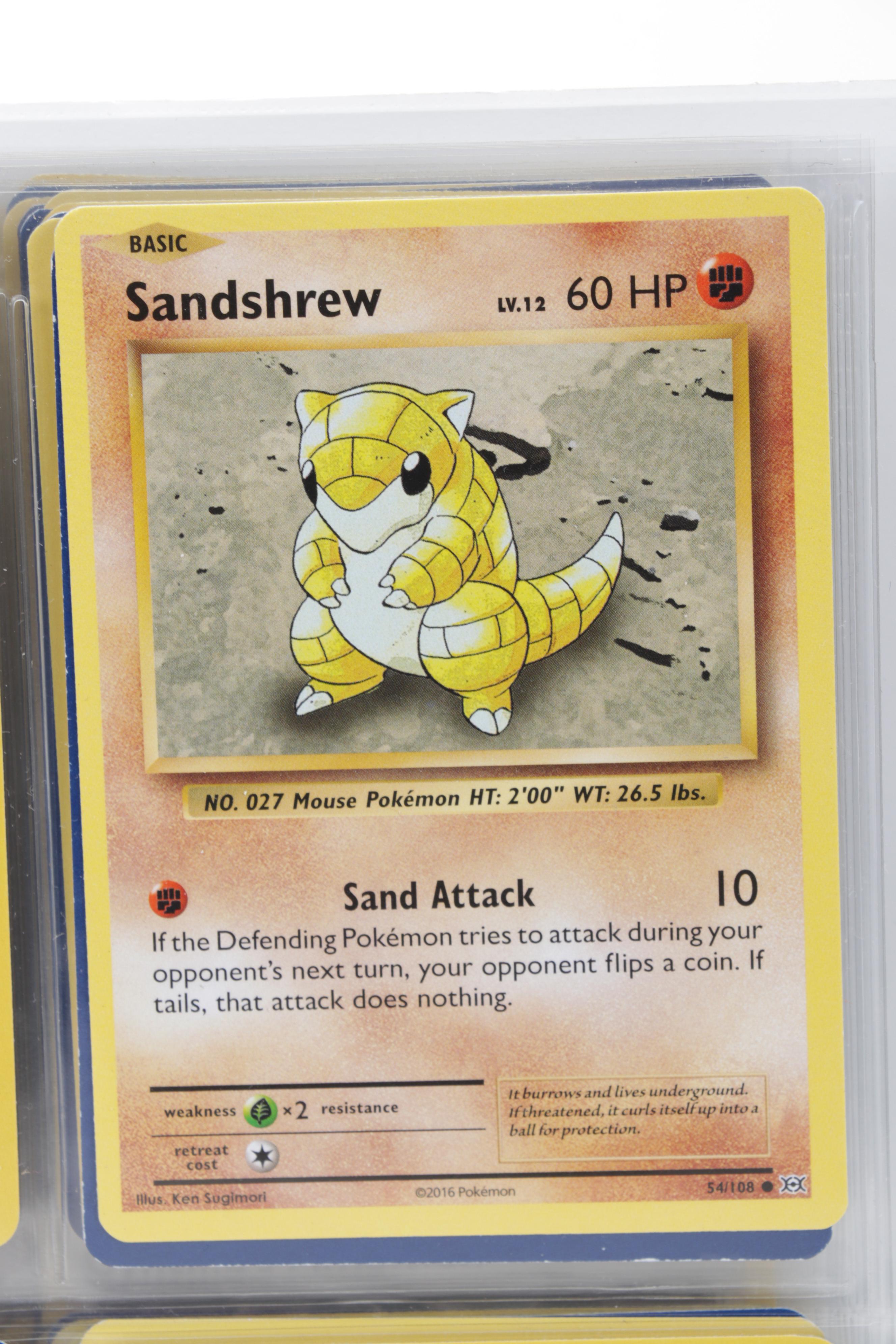 Pokémon Trading Cards Including "Feebas" and First Edition "Brock's Onix"