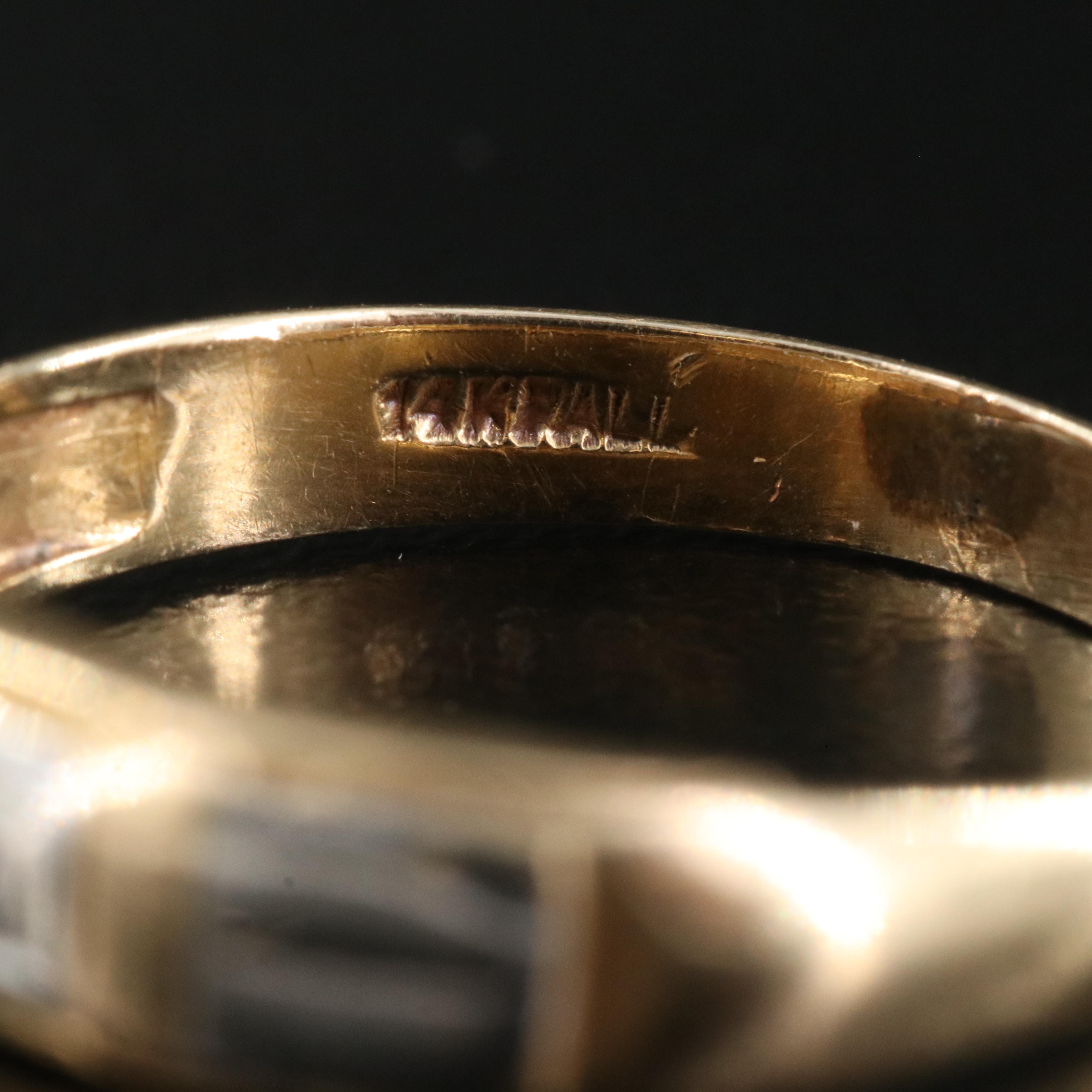 14K 0.03 CT Diamond Ring with Palladium Accents