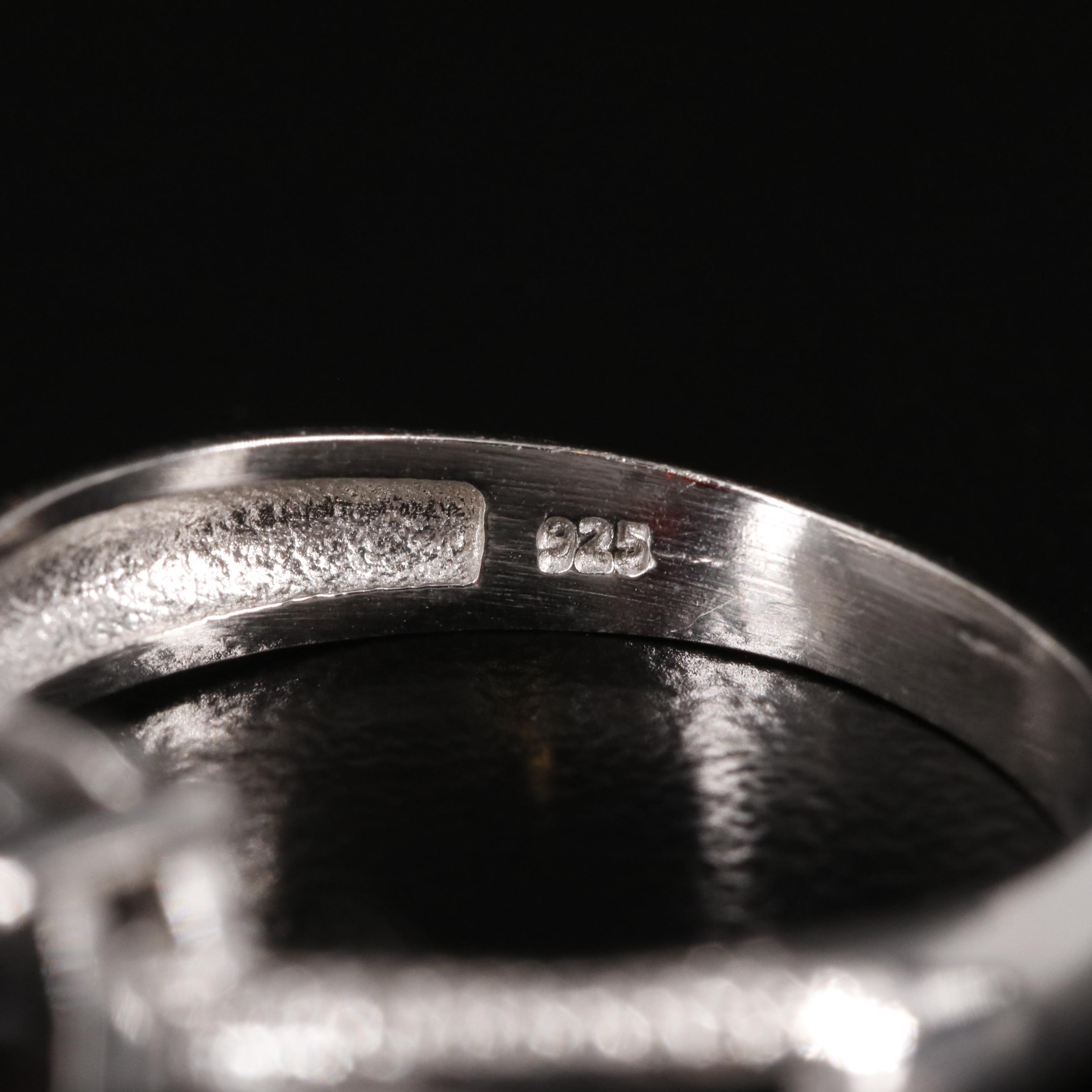 Sterling Garnet Ring with Diamond Accents