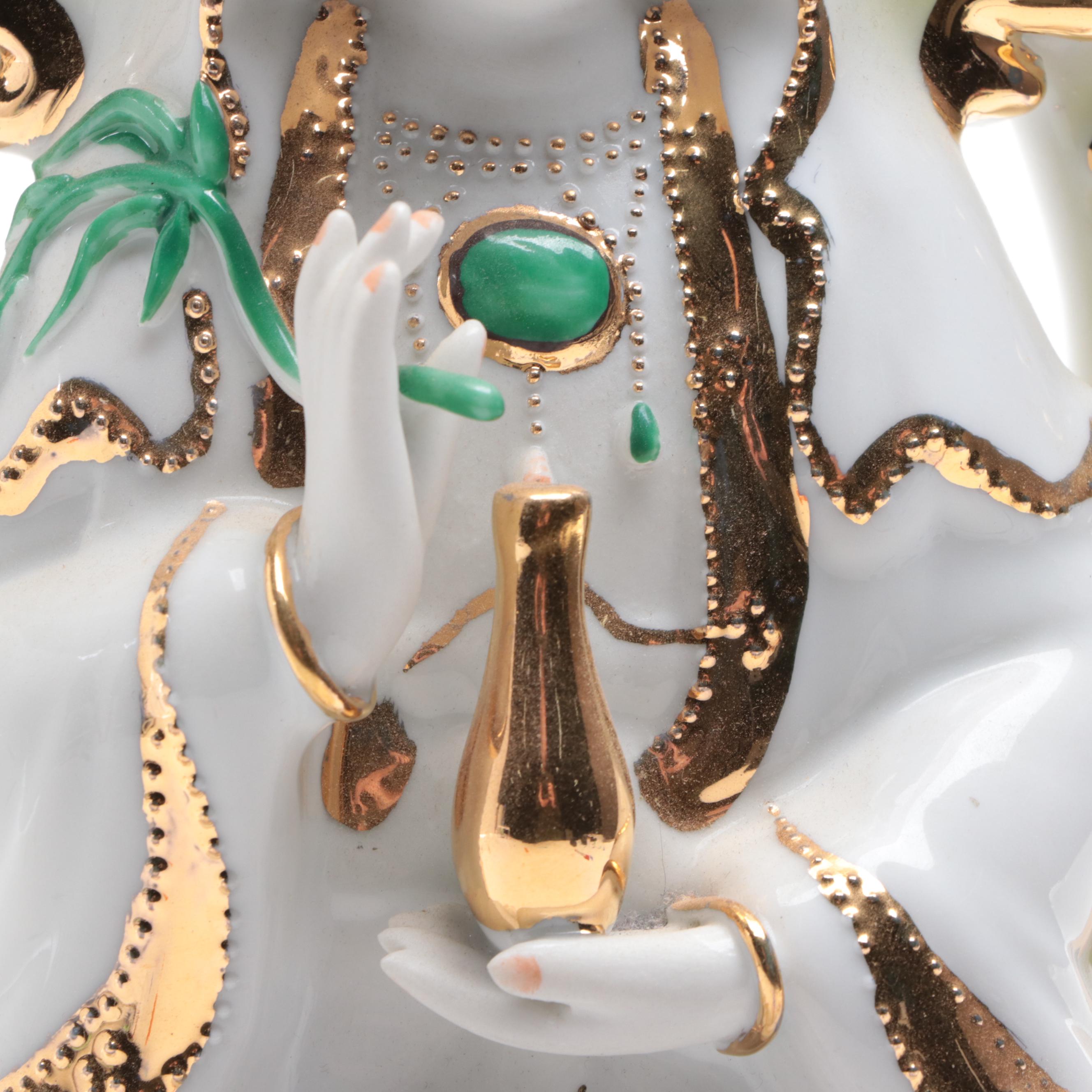 Chinese Porcelain Figurine of Guanyin Seated on a Lotus Flower