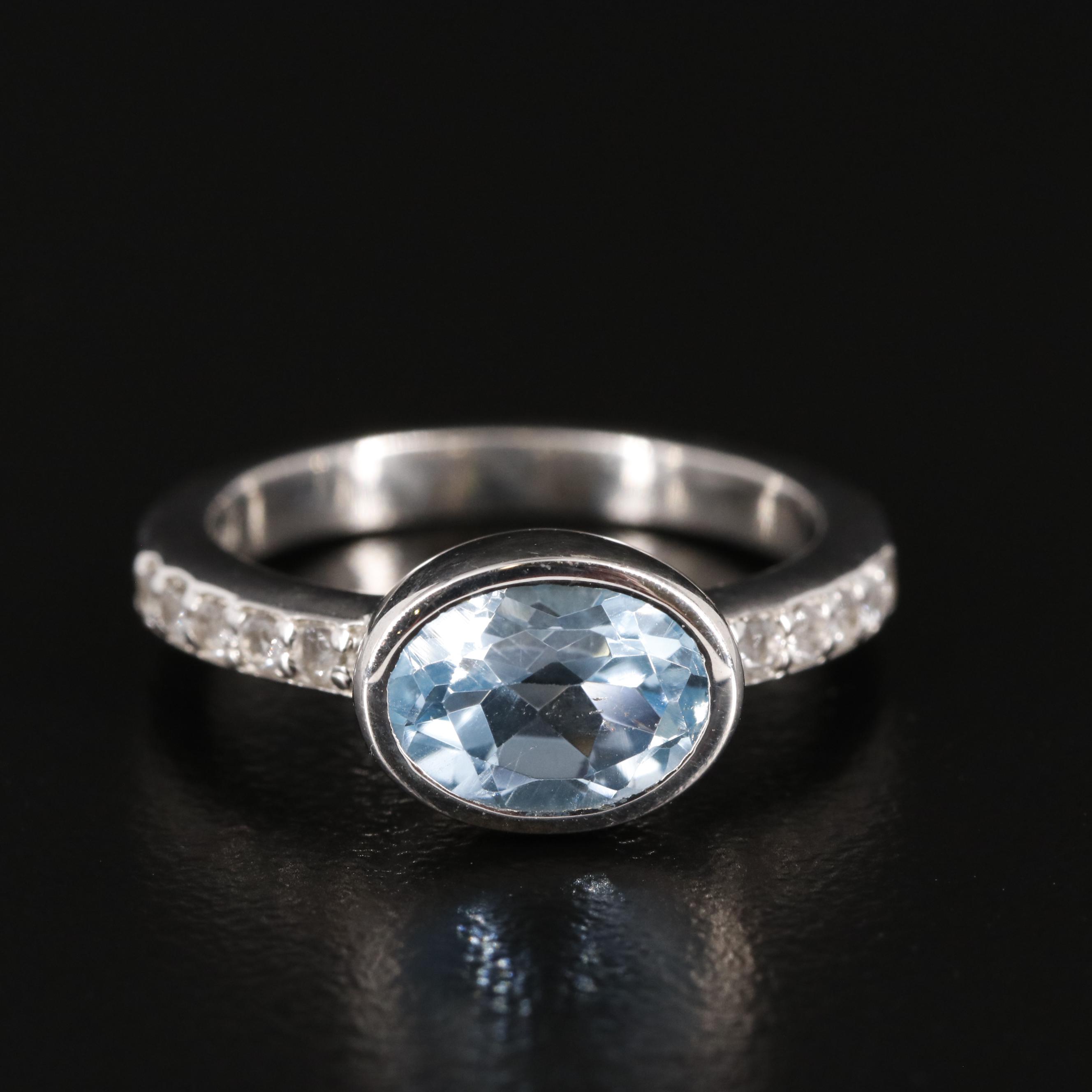 Sterling Blue Topaz Ring with White Topaz Accents