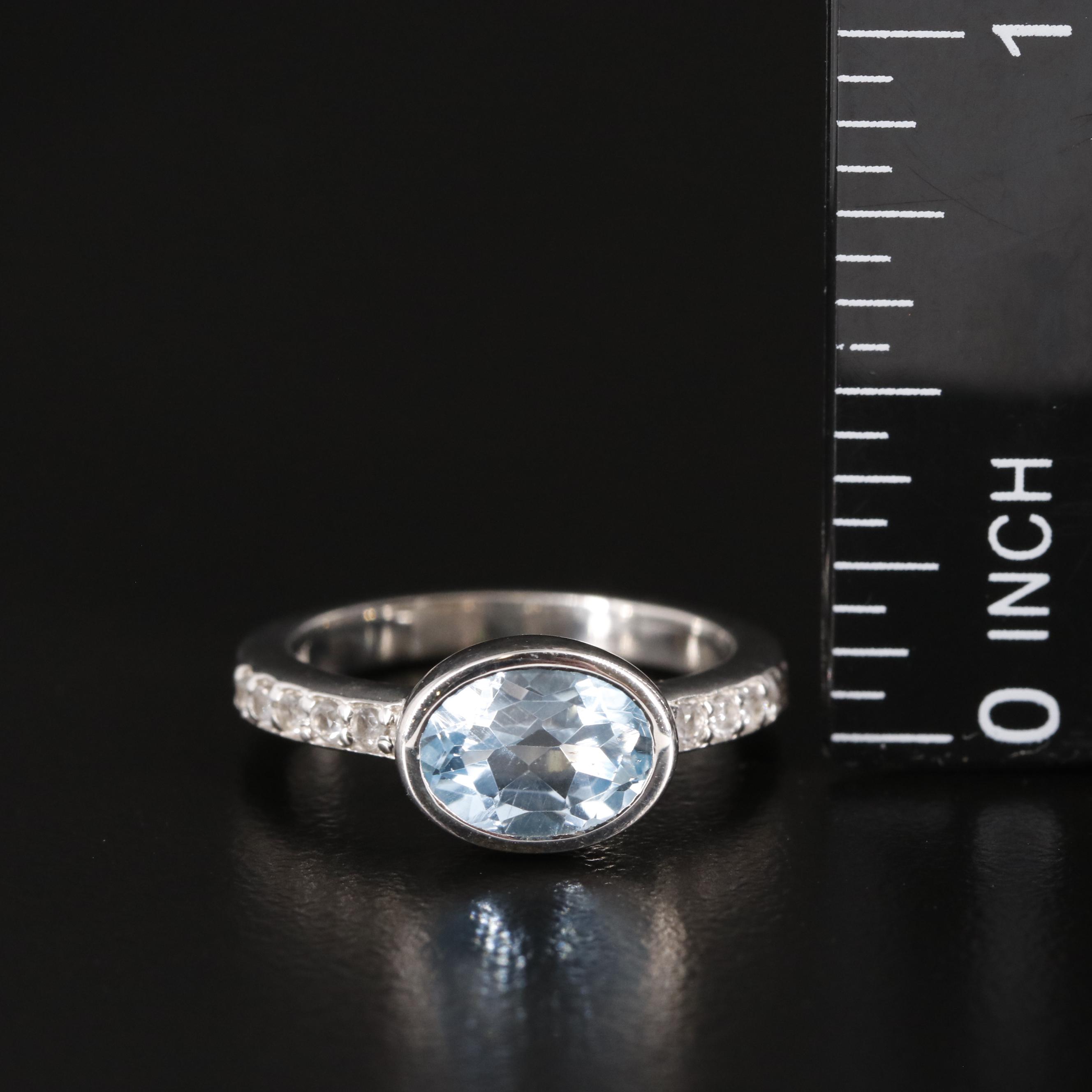 Sterling Blue Topaz Ring with White Topaz Accents
