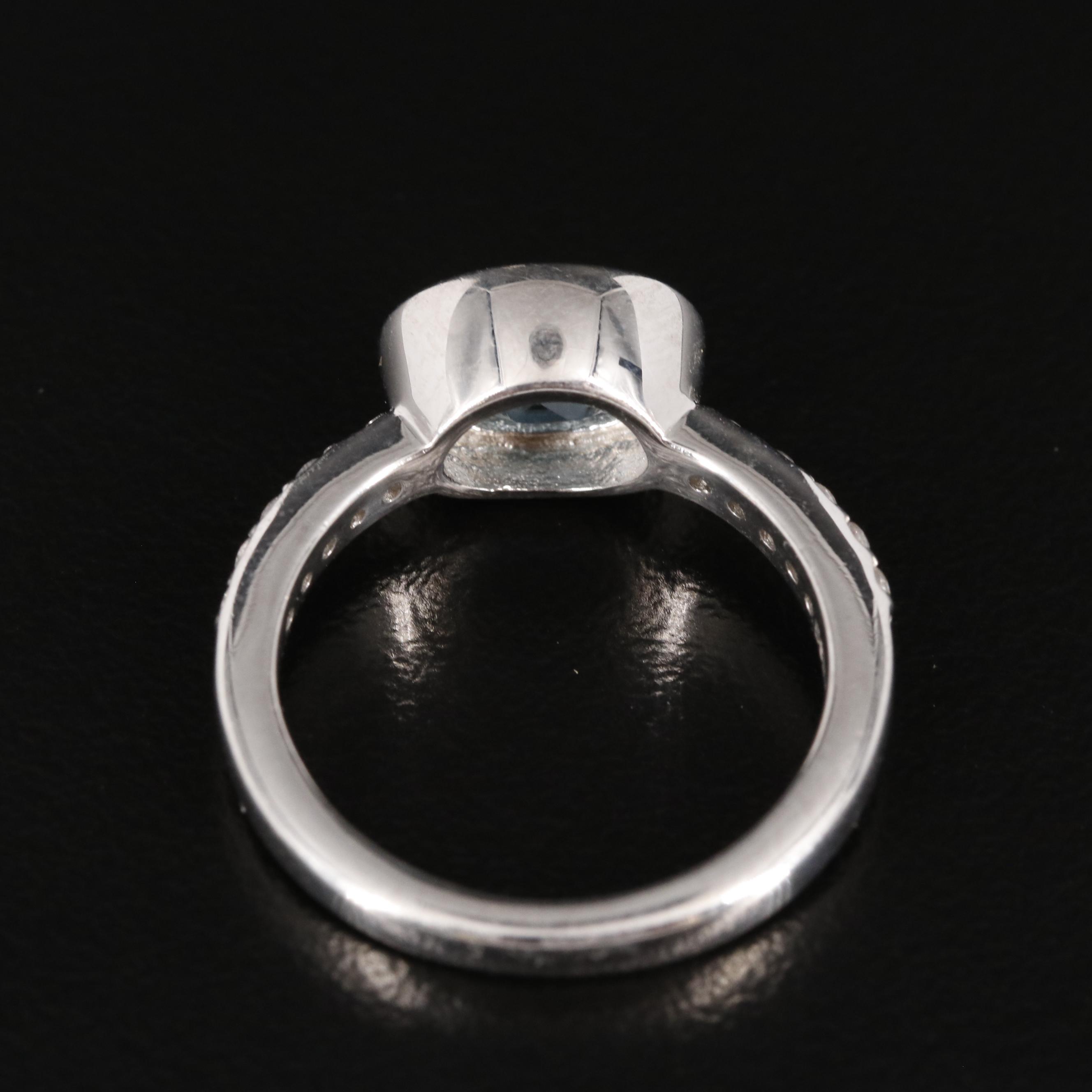 Sterling Blue Topaz Ring with White Topaz Accents
