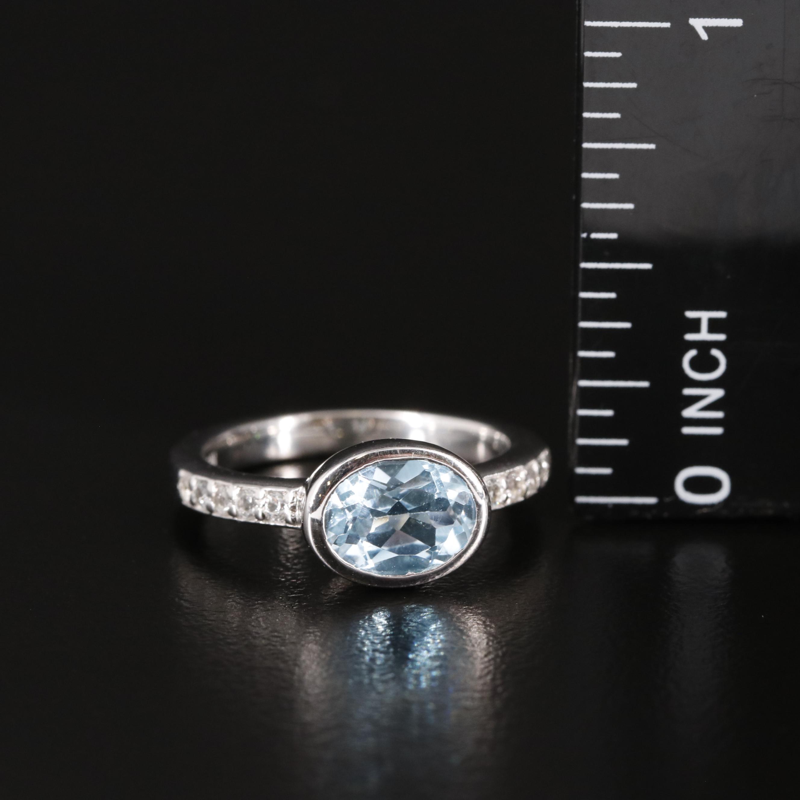 Sterling Blue Topaz Ring with White Topaz Accents