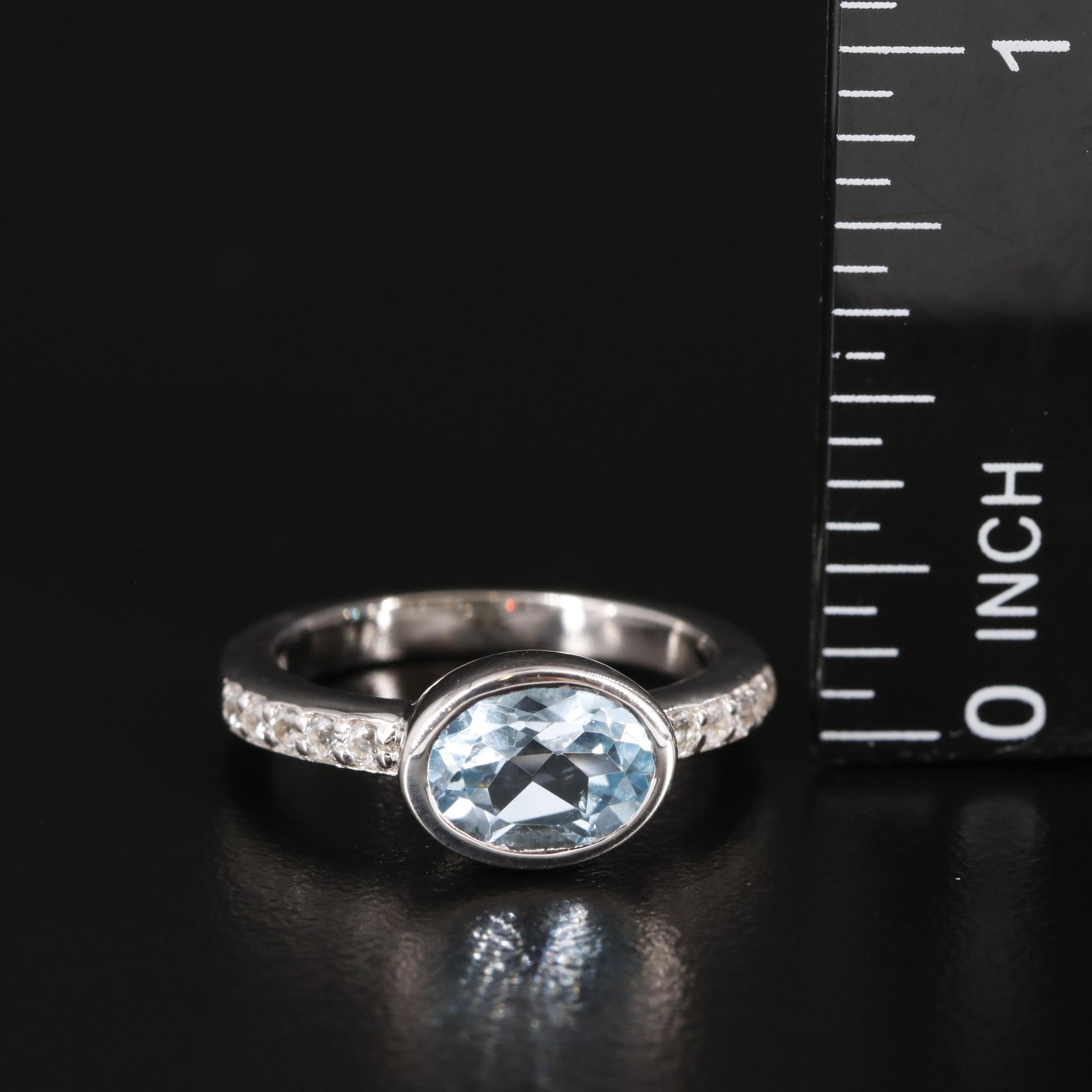 Sterling Blue Topaz Ring with White Topaz Accents