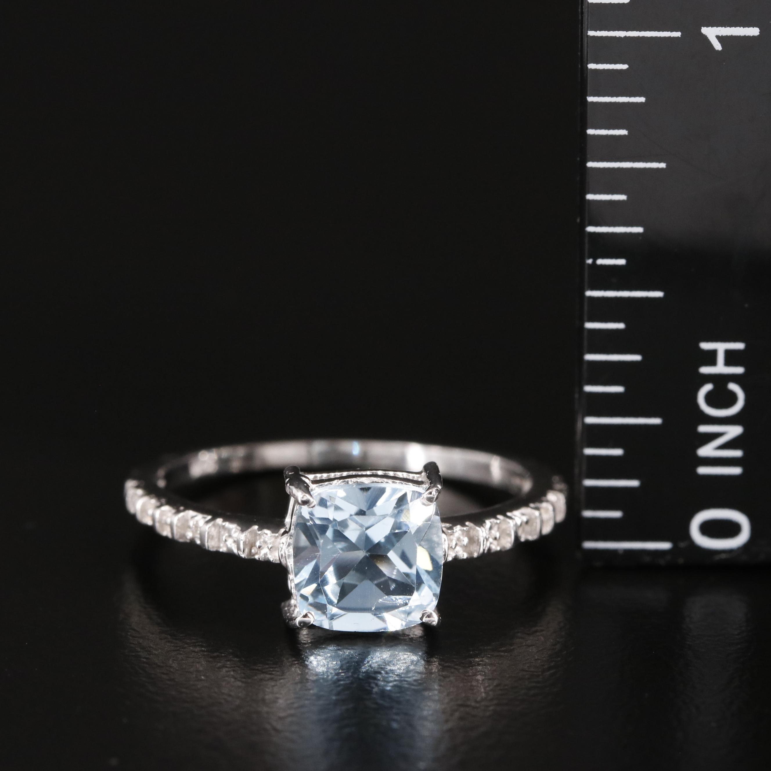 Sterling Blue Topaz Ring with Diamond Accents