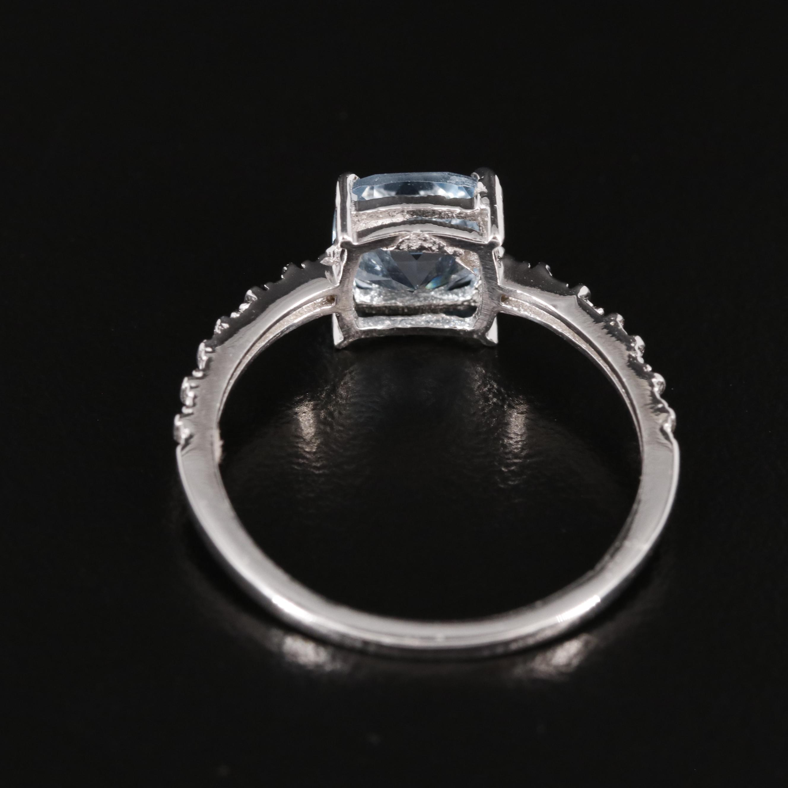 Sterling Blue Topaz Ring with Diamond Accents