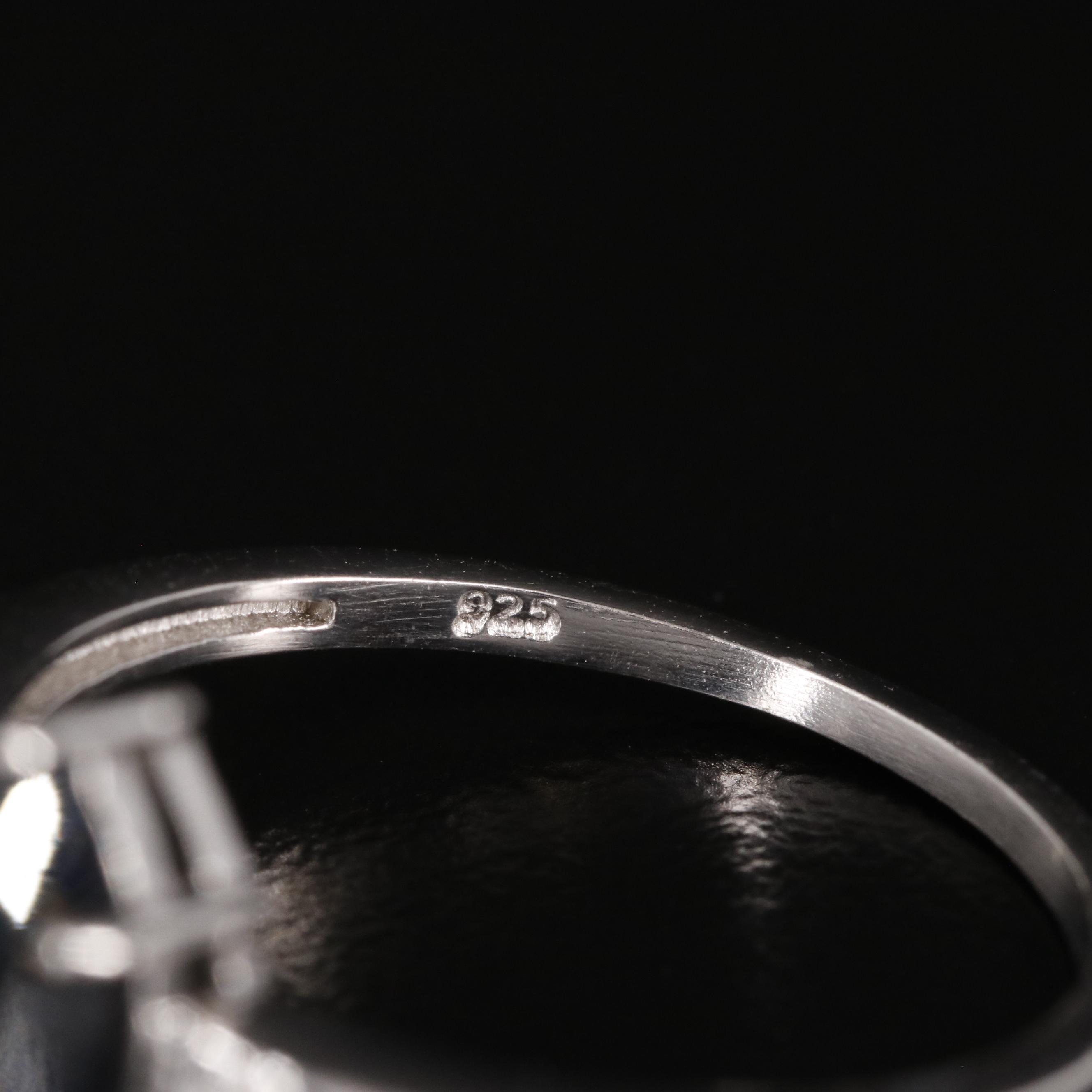 Sterling Sapphire Ring with Diamond Accents